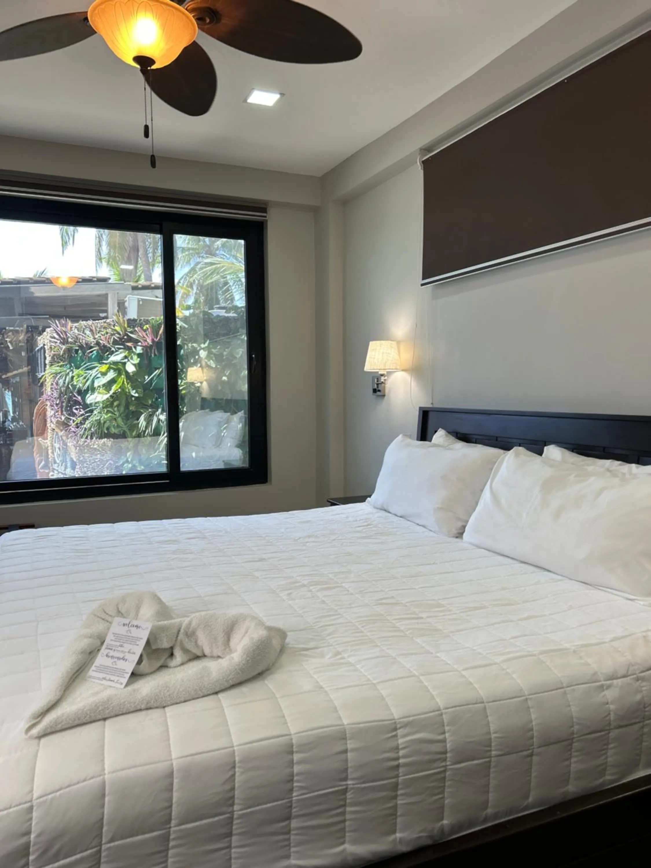 Bed in Brisas Del Mar Beach + Dive Resort