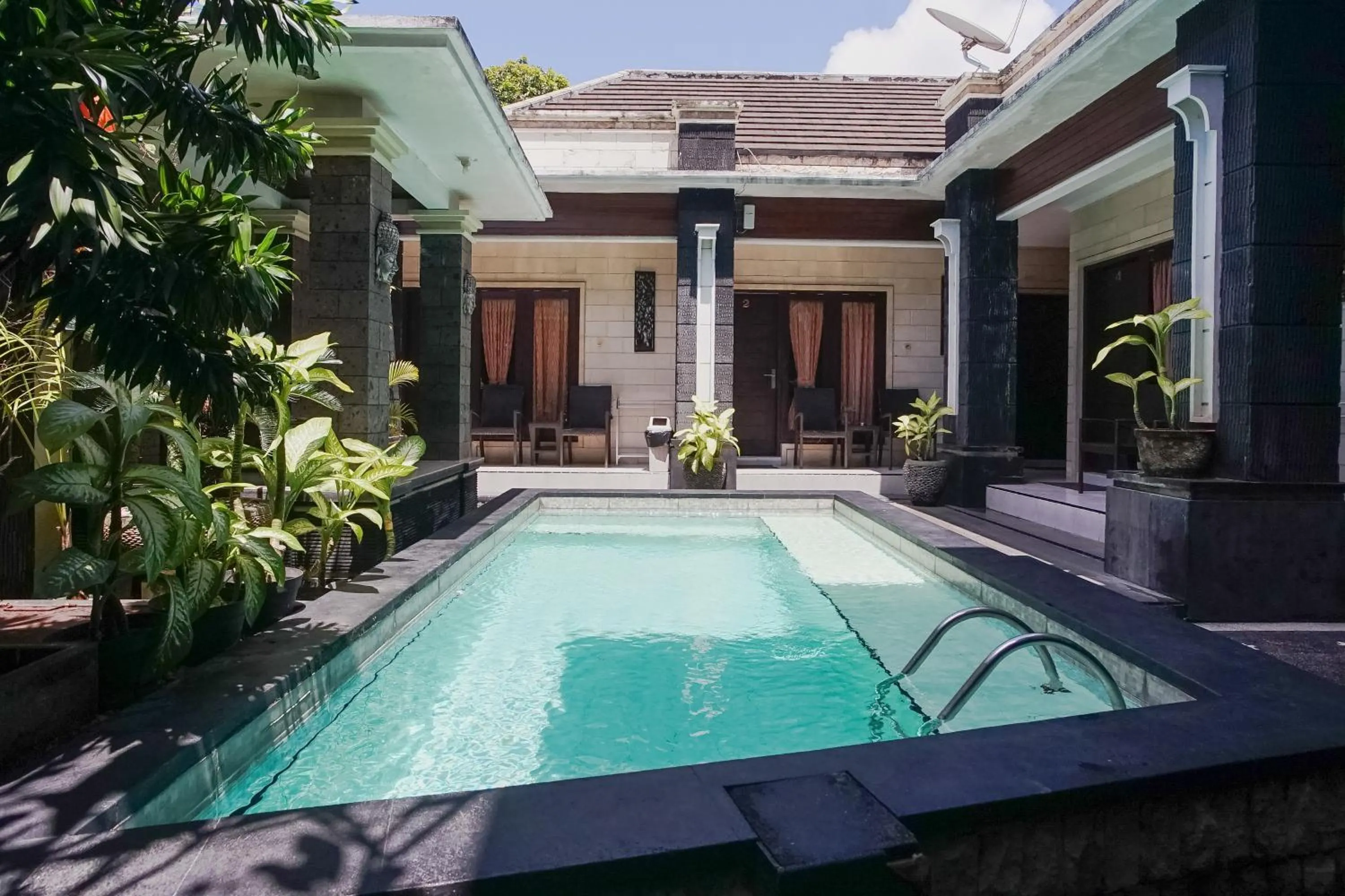 Swimming pool in DENAYS GUESTHOUSE JIMBARAN
