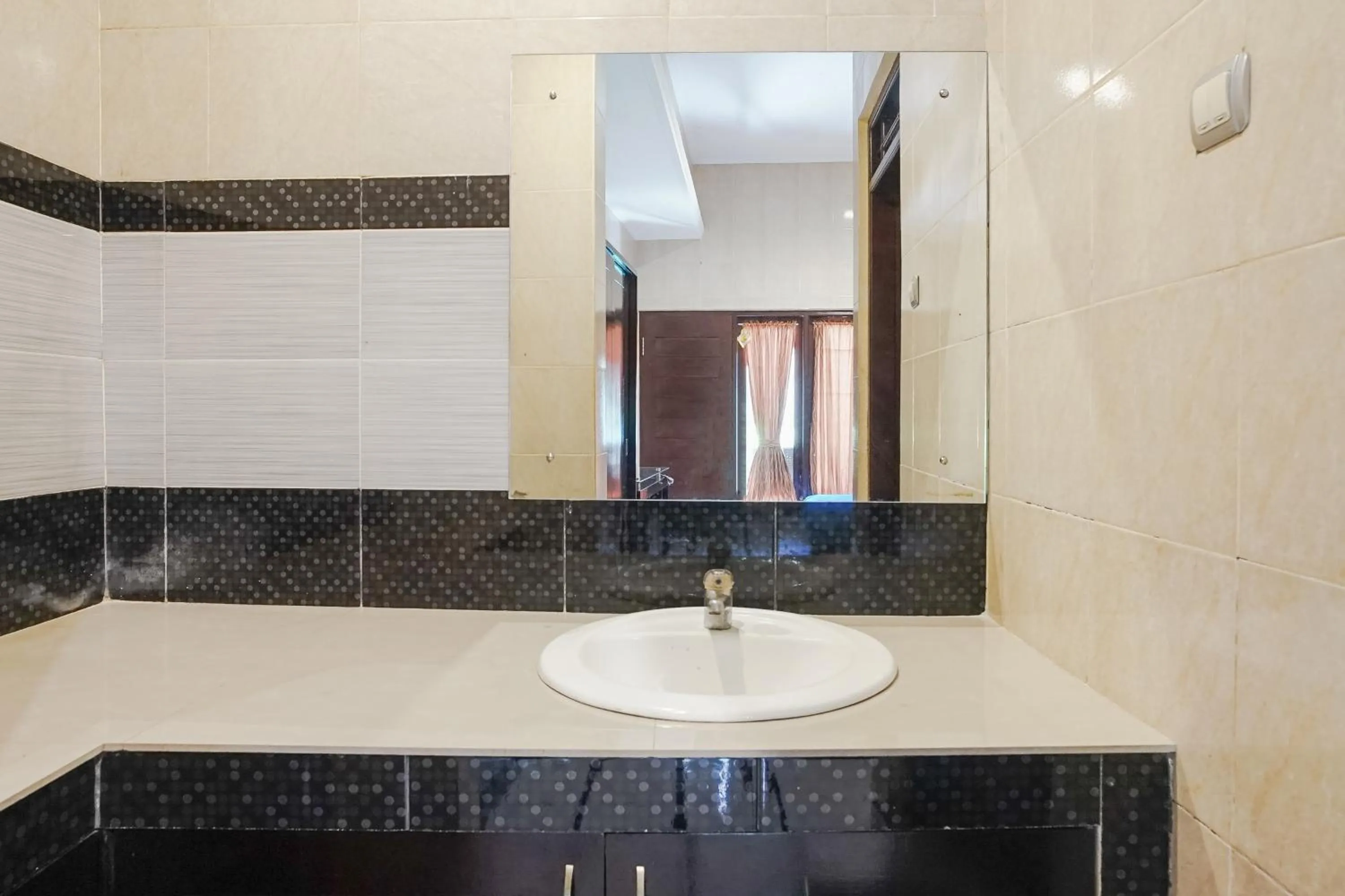 Bathroom in DENAYS GUESTHOUSE JIMBARAN