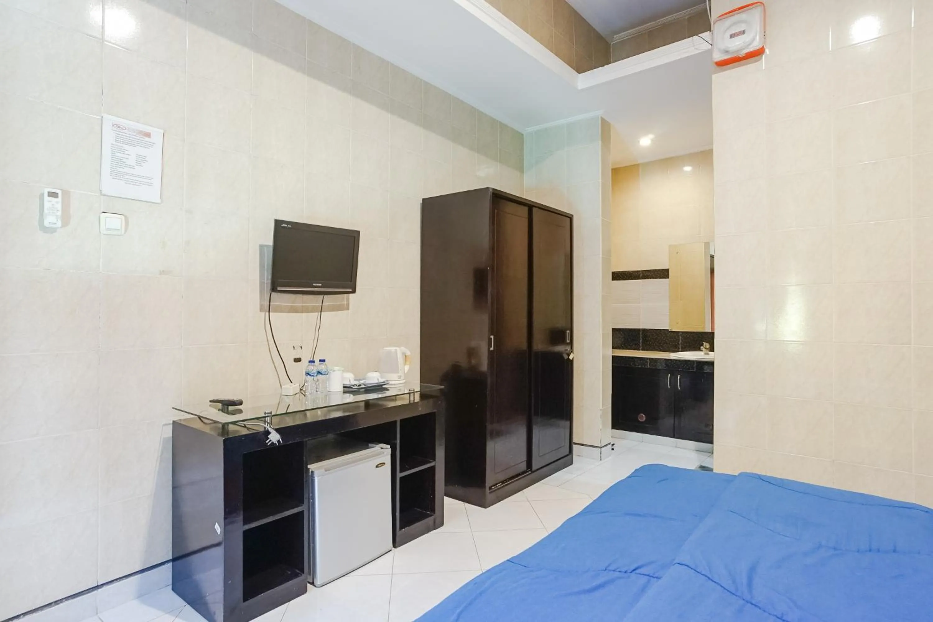 Bed in DENAYS GUESTHOUSE JIMBARAN