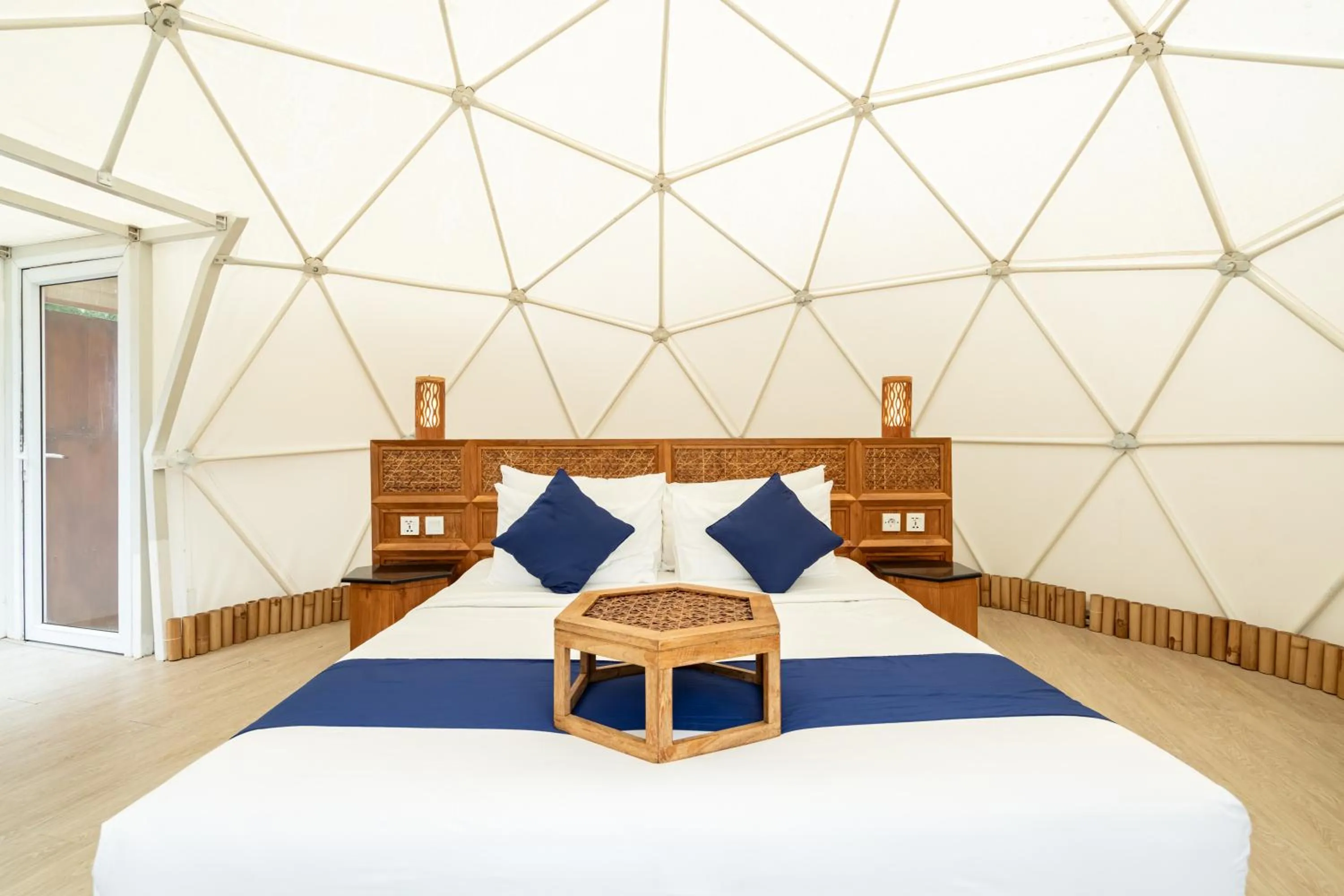 Bed in Triyana Resort and Glamping