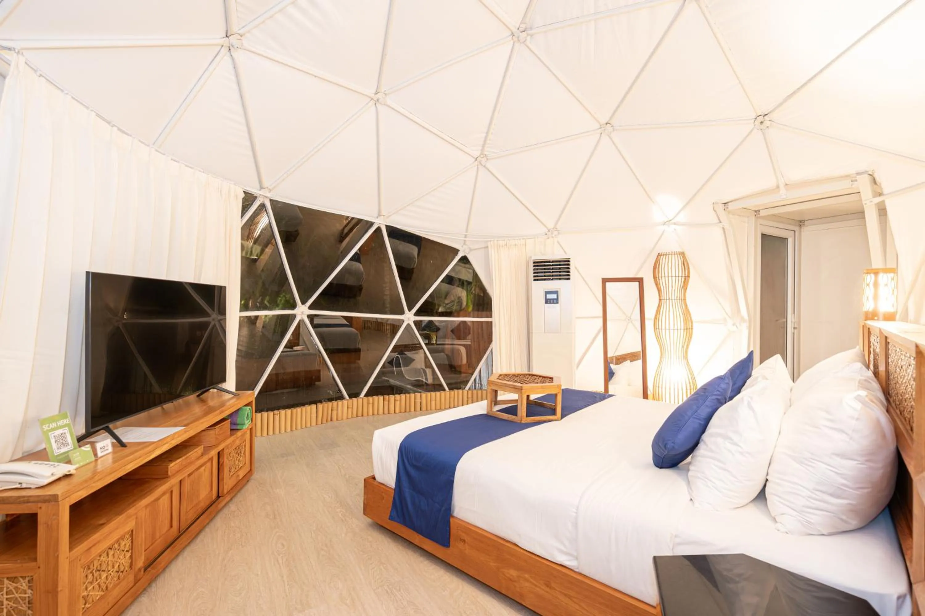 Bed in Triyana Resort and Glamping
