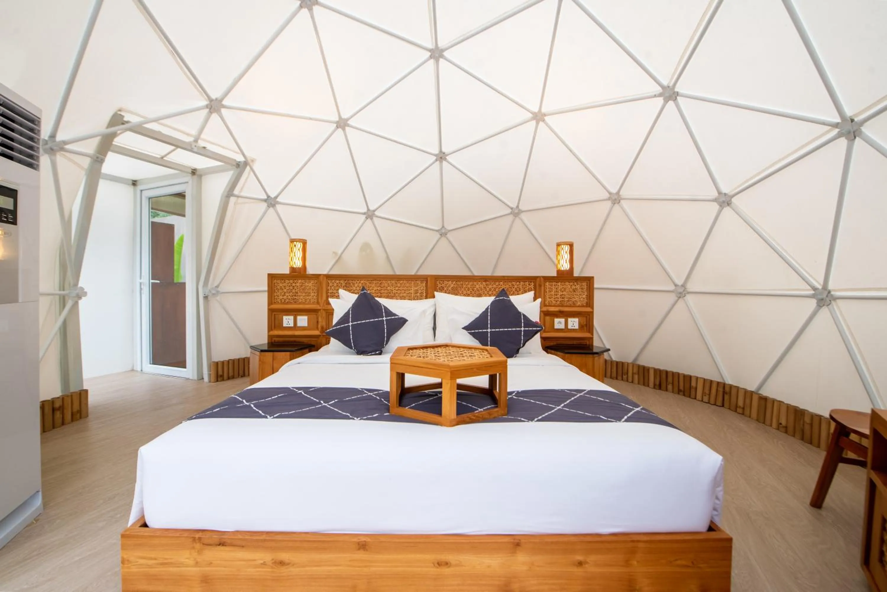 Bed in Triyana Resort and Glamping