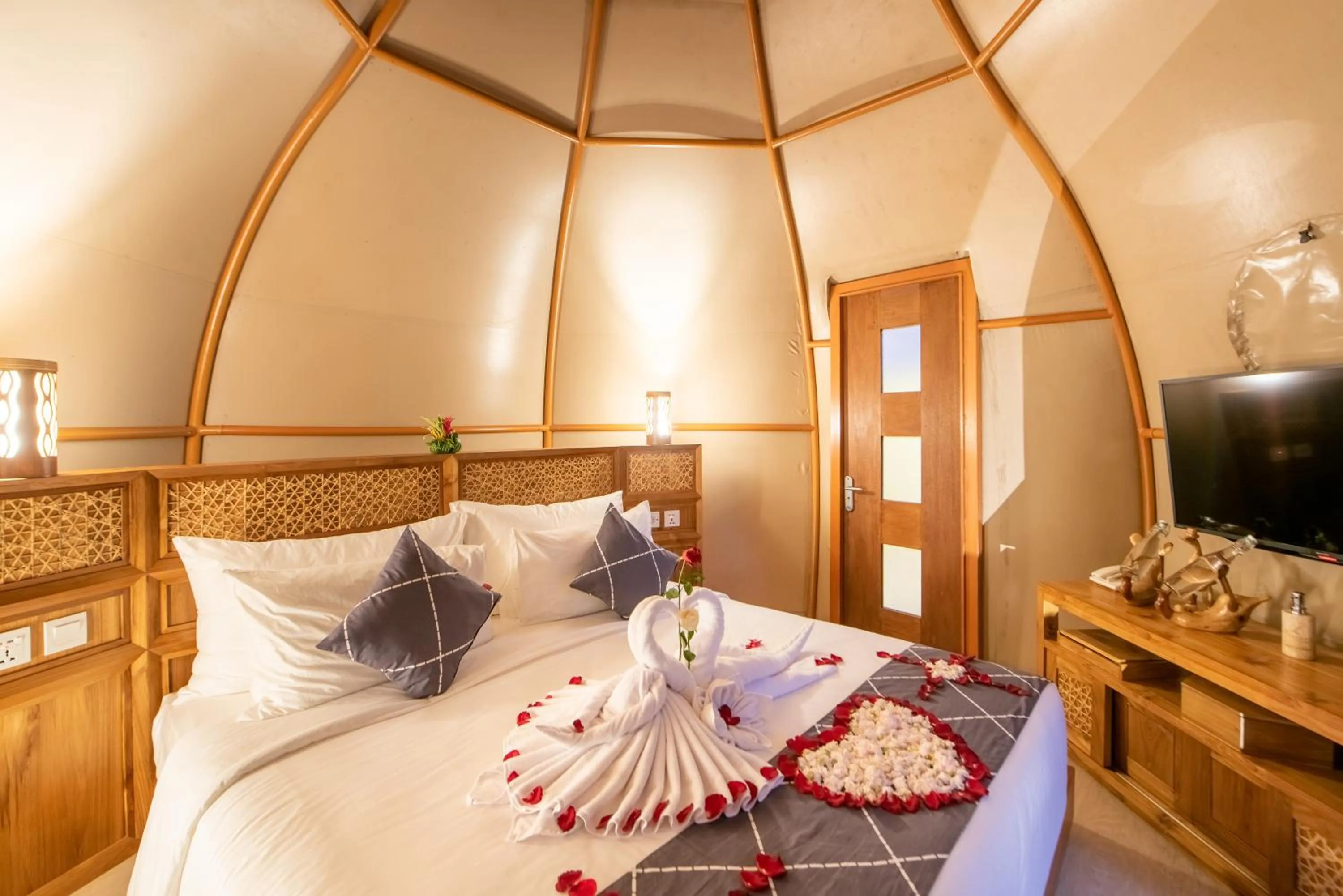 Bed in Triyana Resort and Glamping