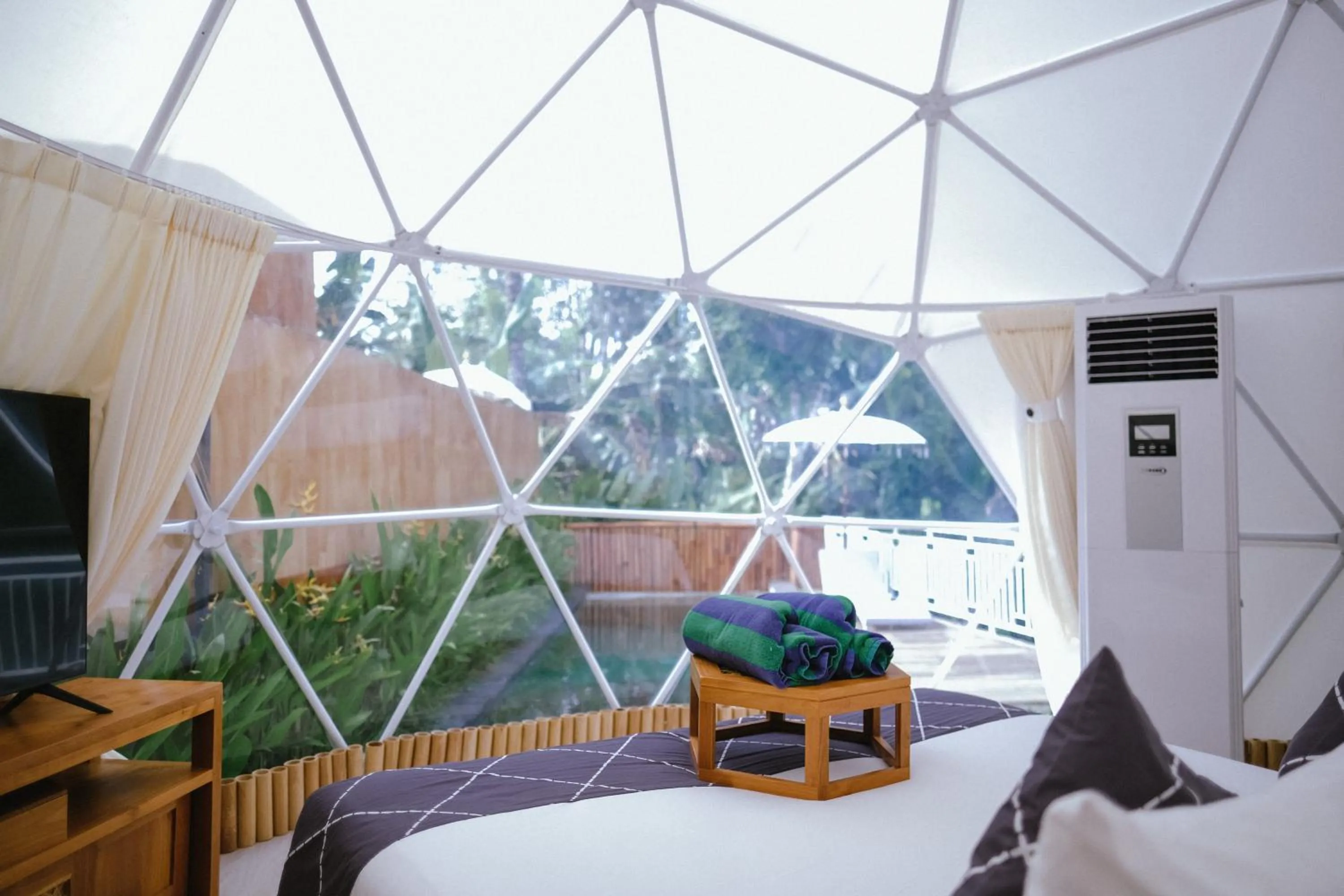 Property building, Bed in Triyana Resort and Glamping