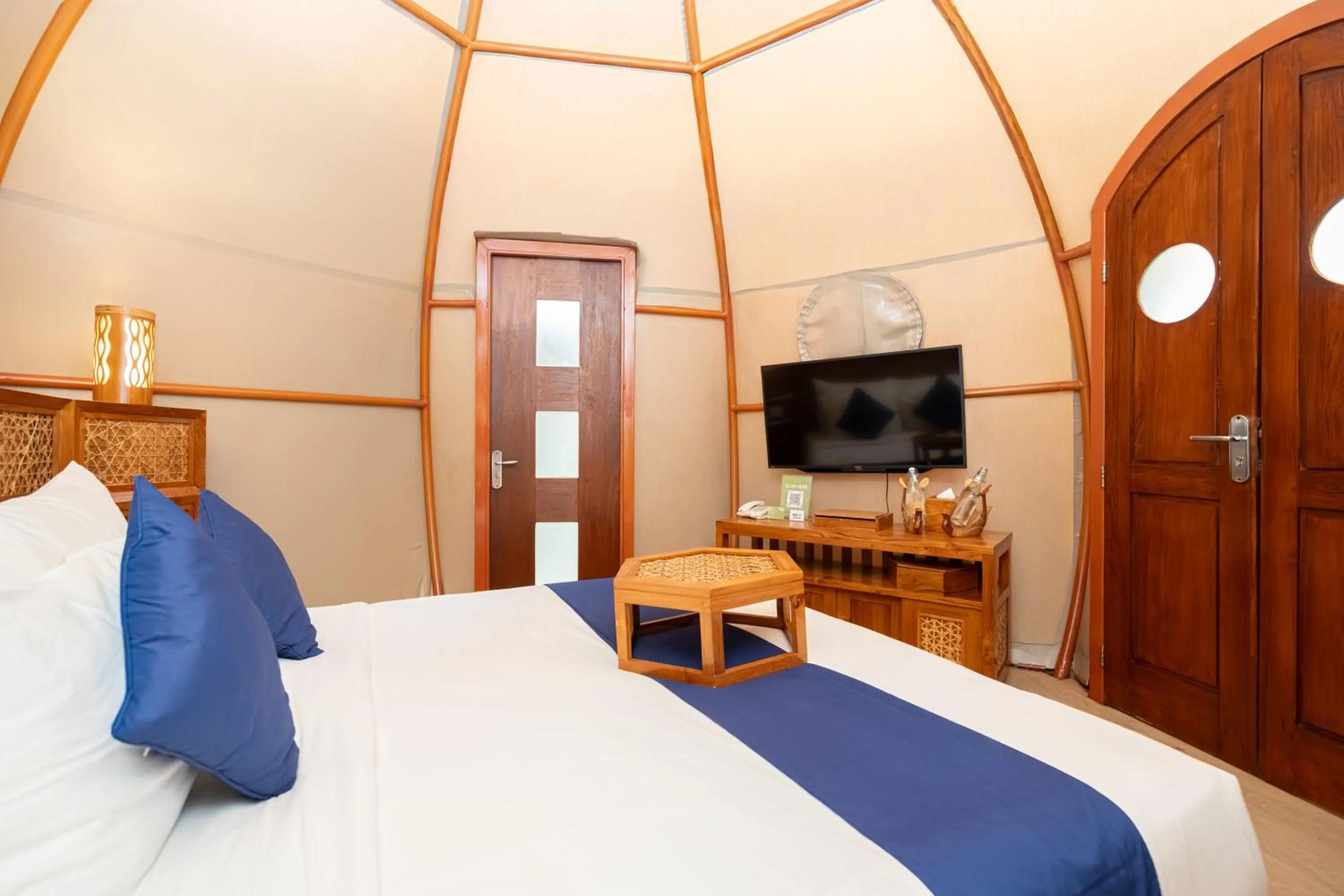 Bed in Triyana Resort and Glamping