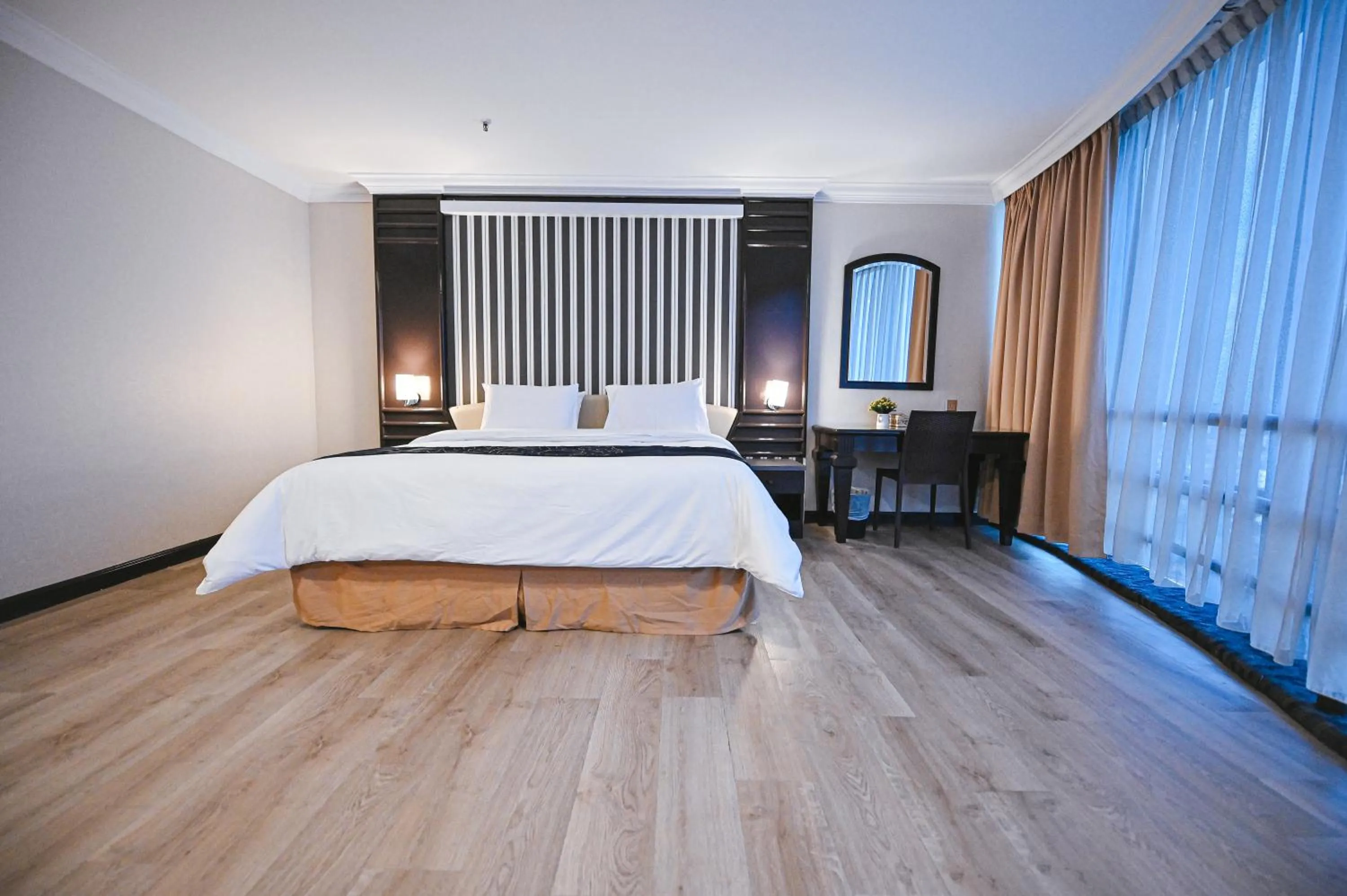 Bed in PRIME CITY HOTEL KLUANG