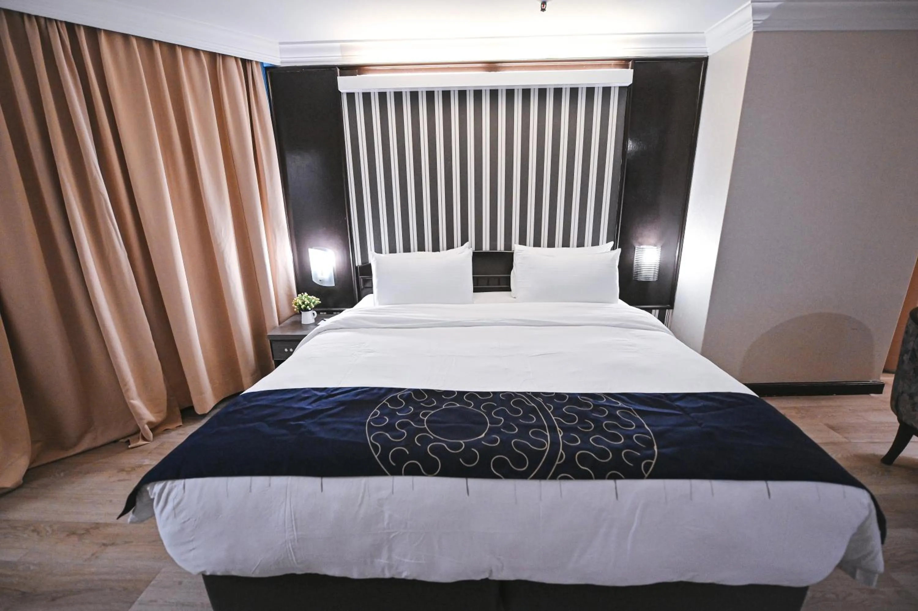 Bed in PRIME CITY HOTEL KLUANG