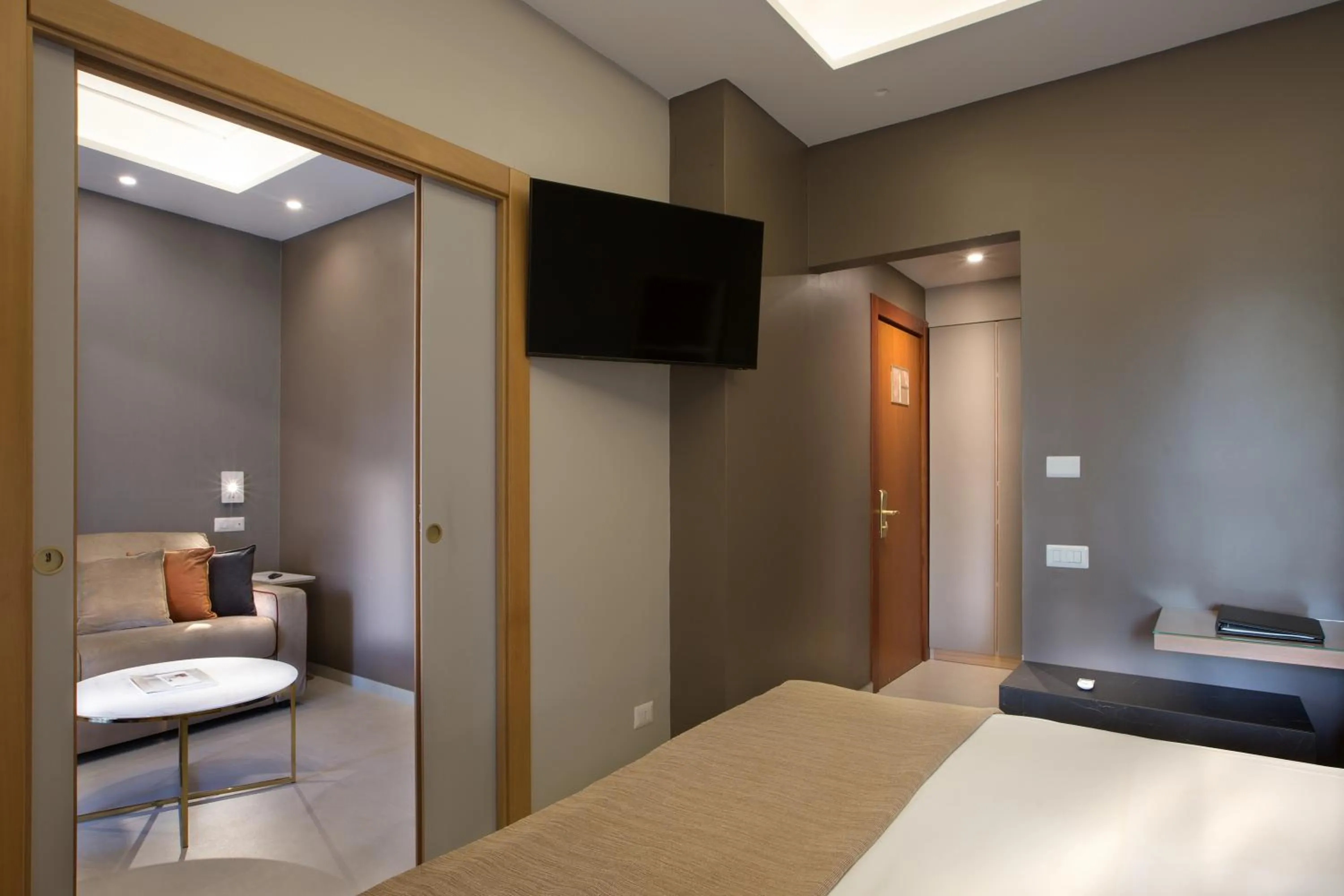 Living room, Bed in Montespina Park Hotel