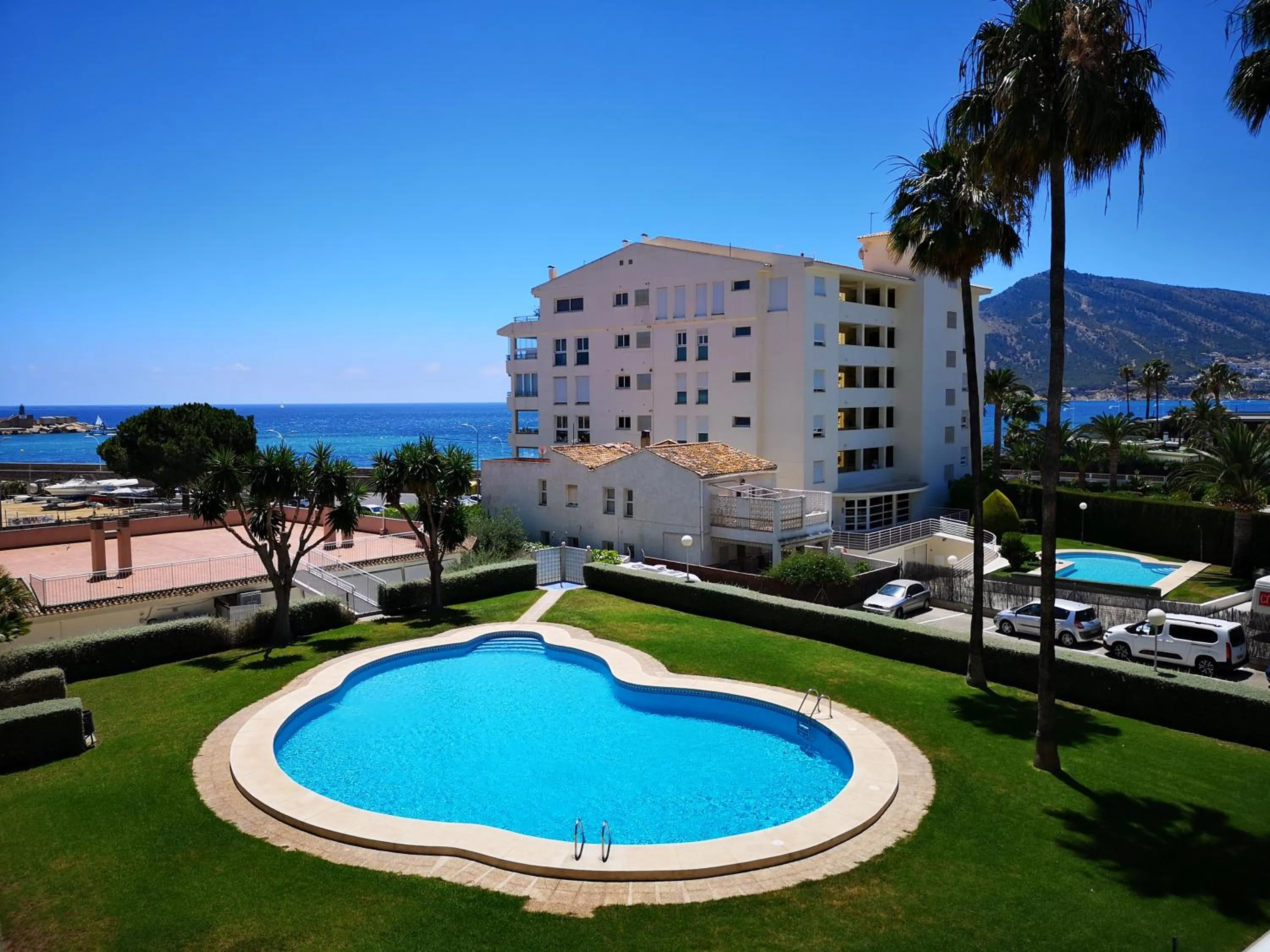 Pool view in Acogedor apartamento frente al mar con piscina