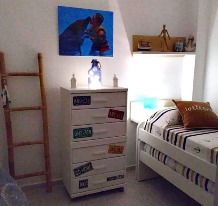 Bed in Little Paradise . Apartment in front of the sea