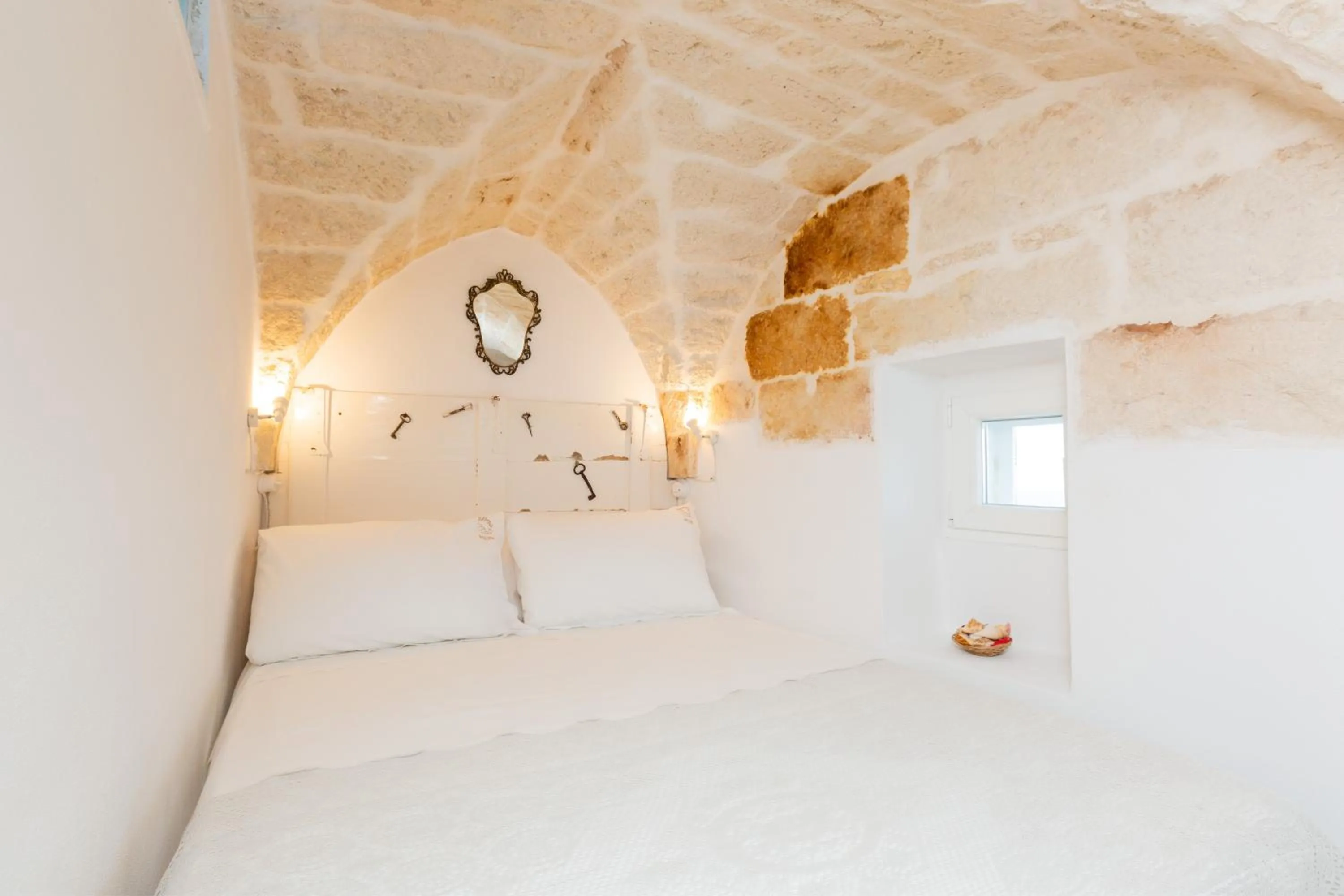 Bed in BELLE HOME OSTUNI vasca vista mare