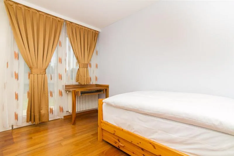 Bed in Hotel Swiss Views