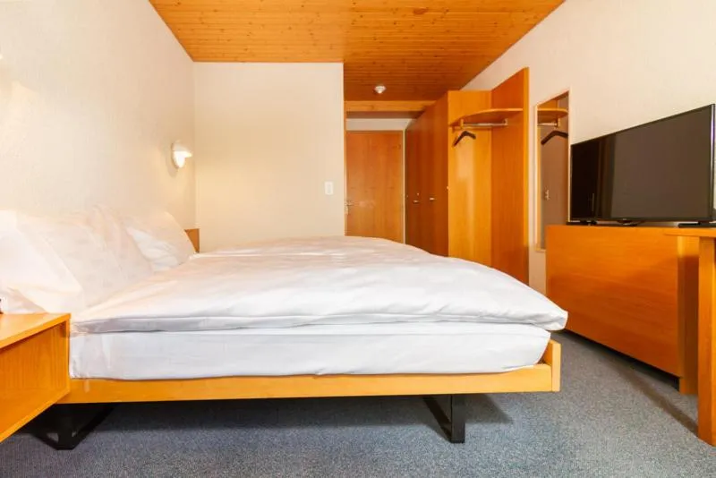 Bed in Hotel Swiss Views