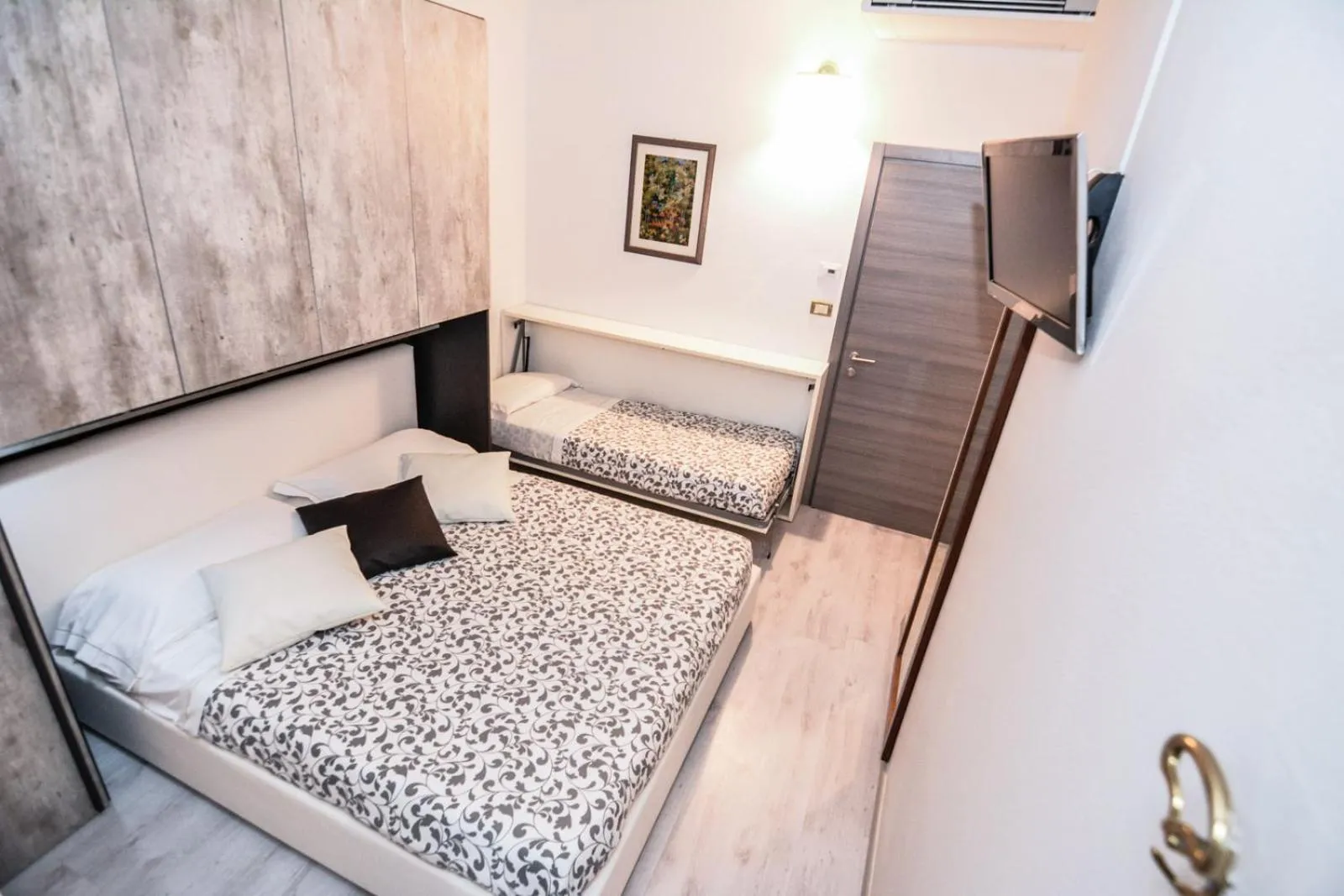 Bed in Hotel Gardesana