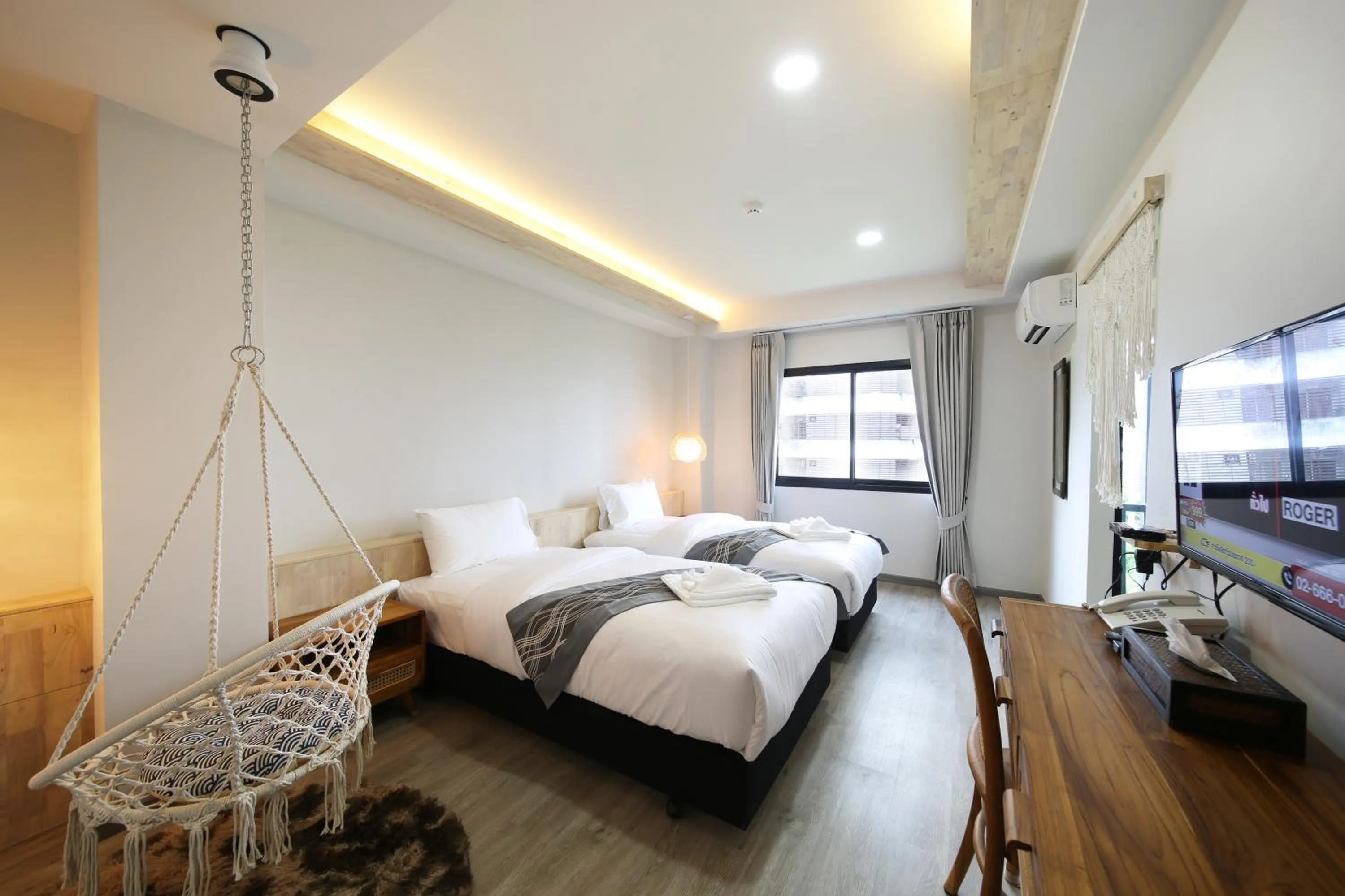 Bed in The Wood Pattani Hotel