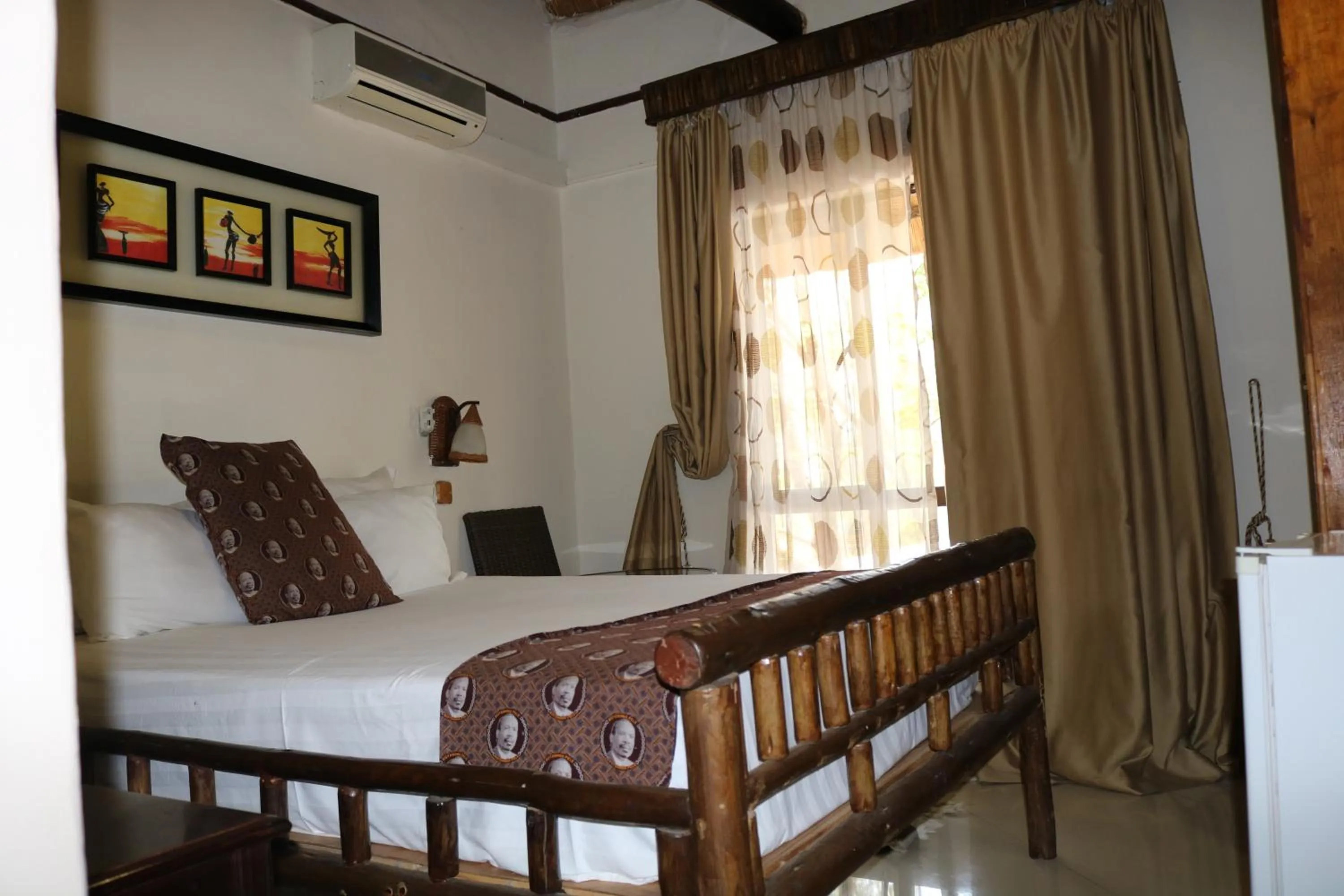 Bed in African Home Hotel