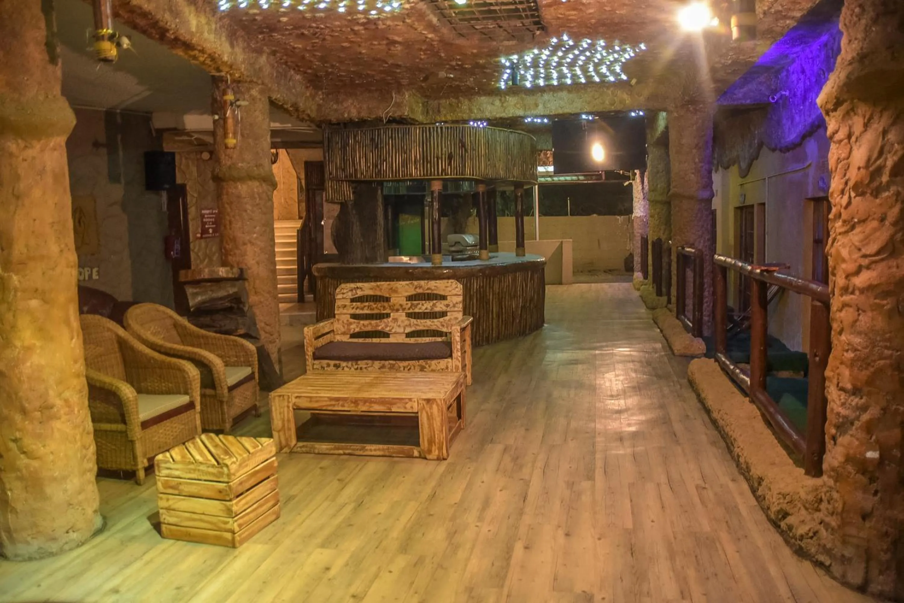 Lounge or bar in African Home Hotel