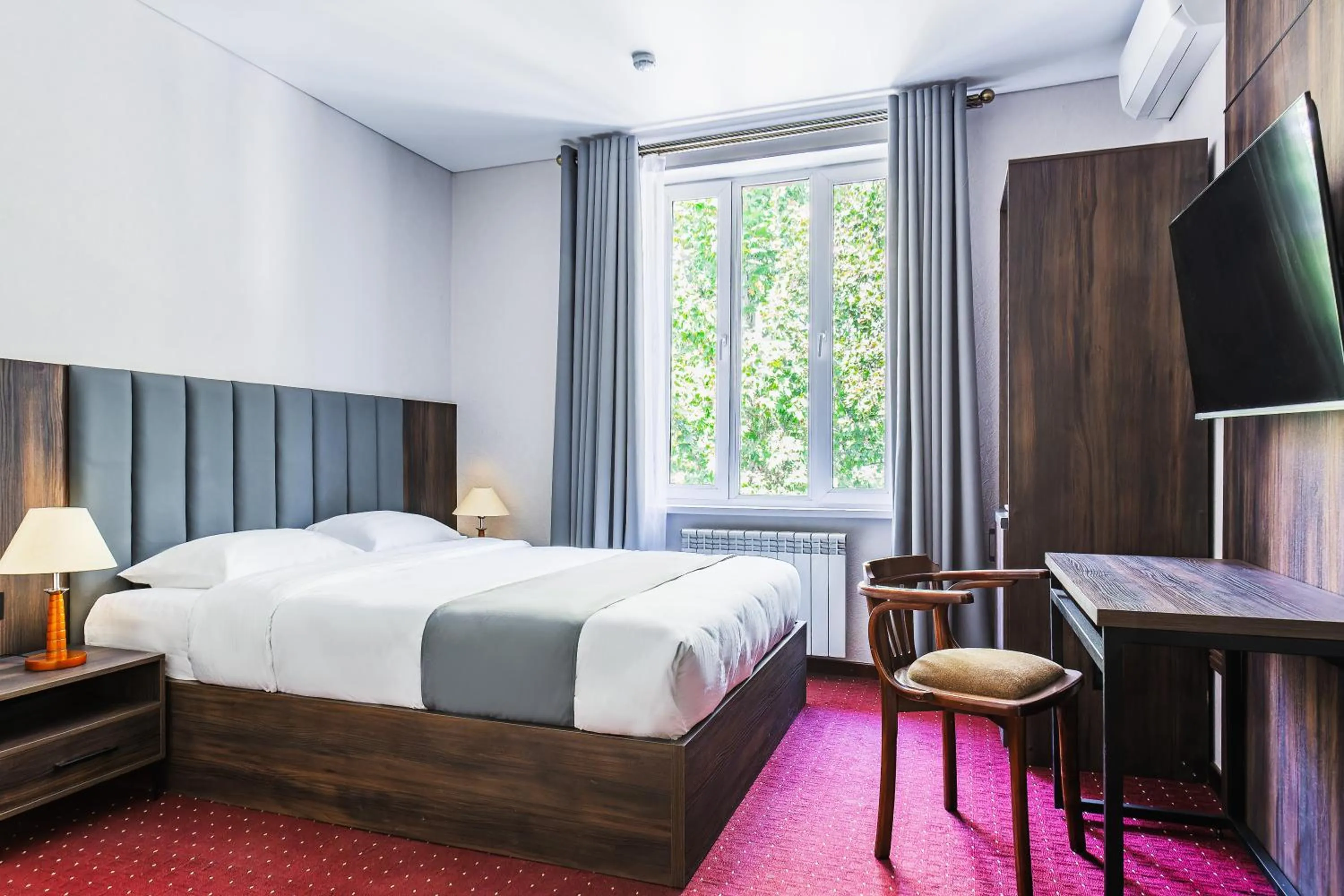 Bed in Grand Nur Hotel