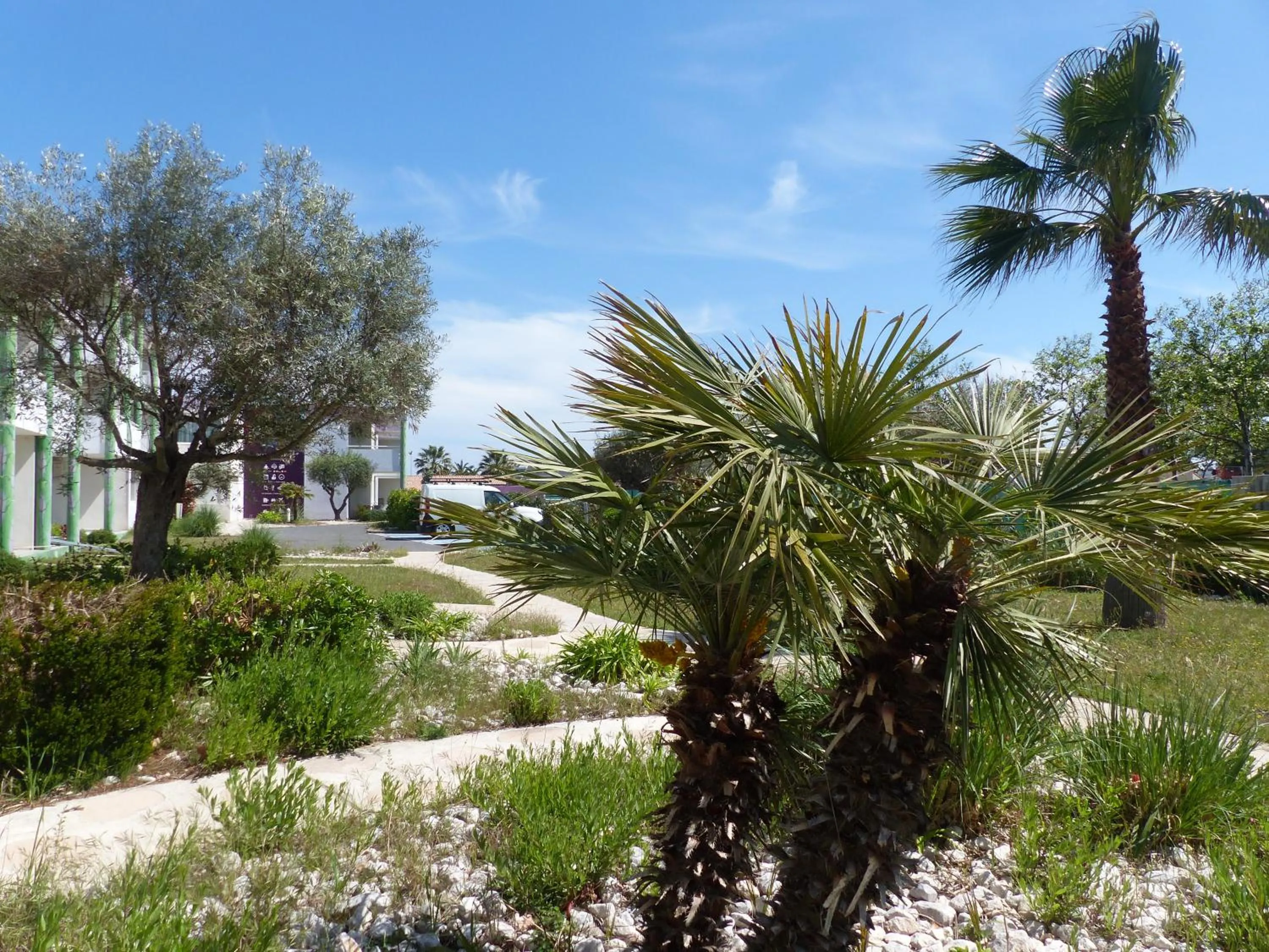 Garden view in Le Jardin de Babylone Résidence Festive & Naturiste "réservé aux couples uniquement"