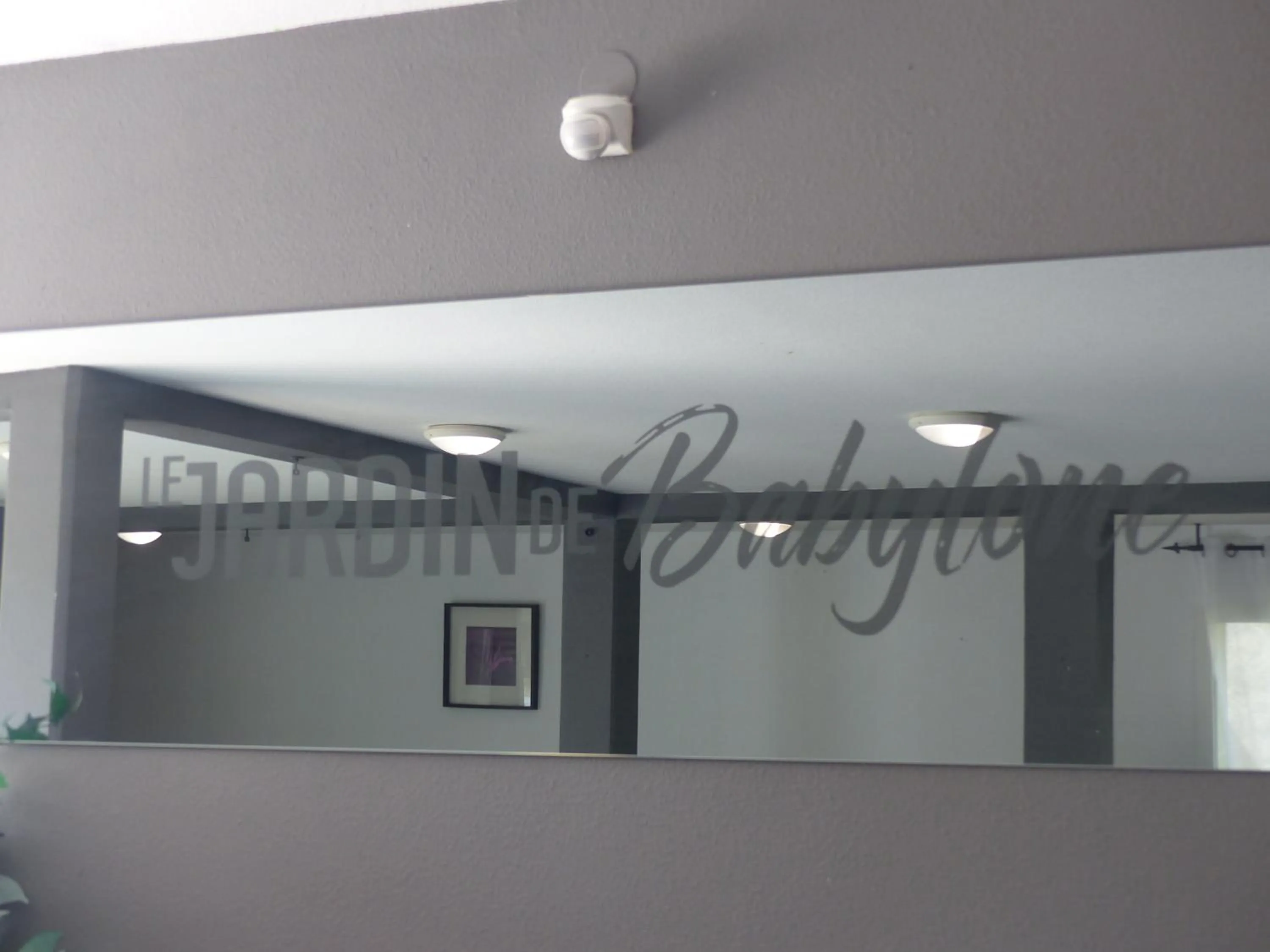 Property logo or sign in Le Jardin de Babylone Résidence Festive & Naturiste "réservé aux couples uniquement"