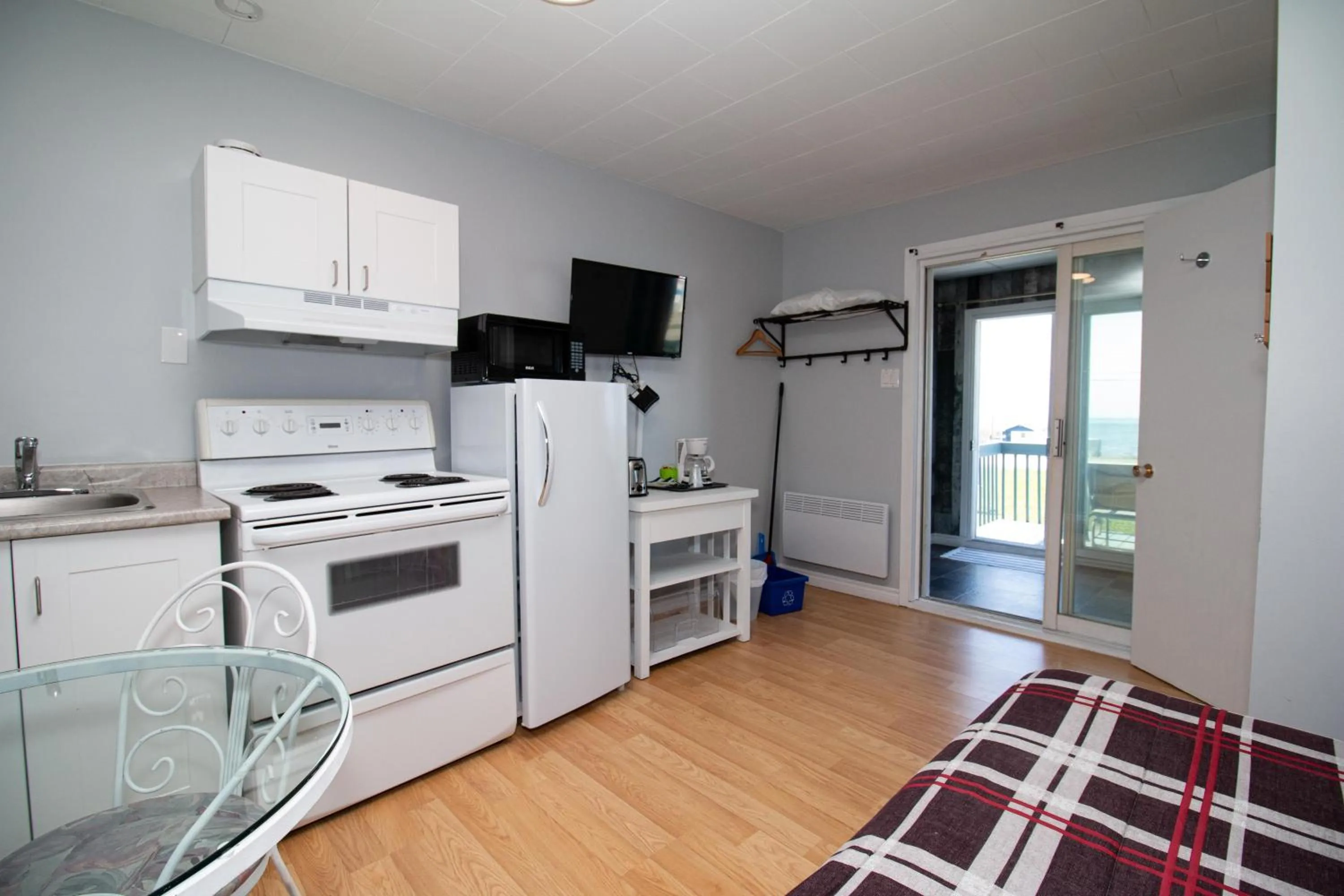 Kitchen or kitchenette in Motel de la mer