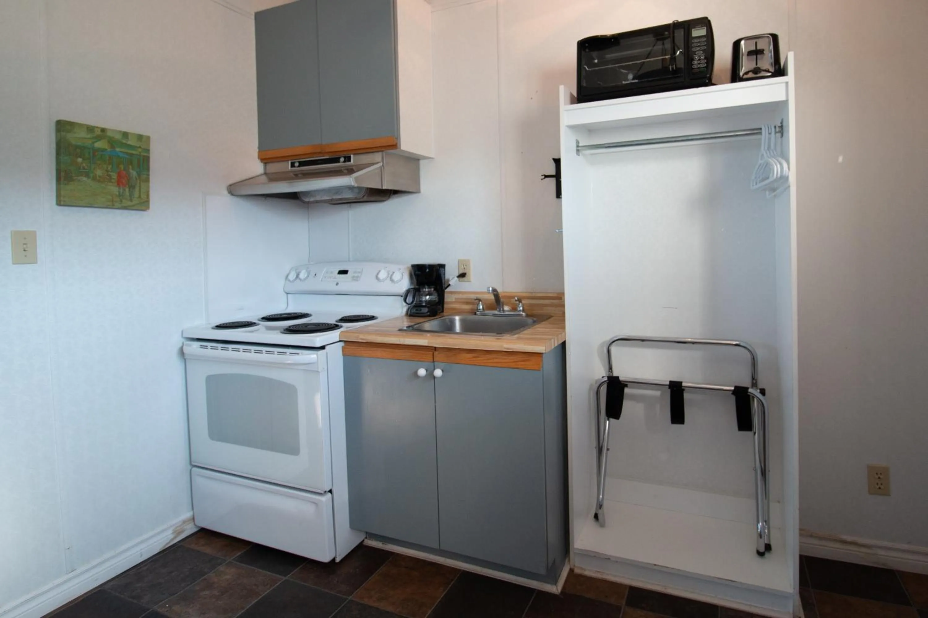 Kitchen or kitchenette in Motel de la mer