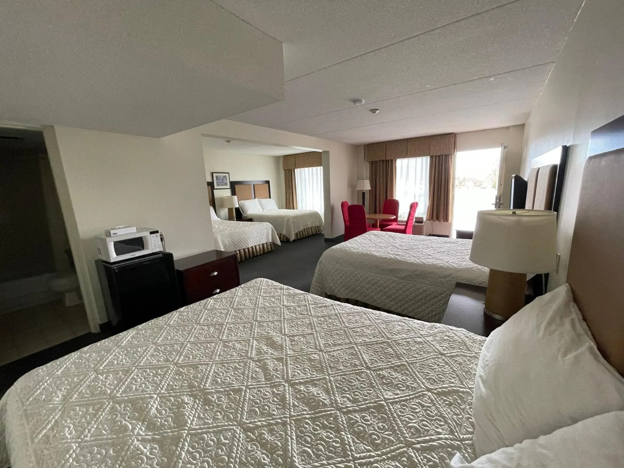 Bed in Heritage Inn & Suites