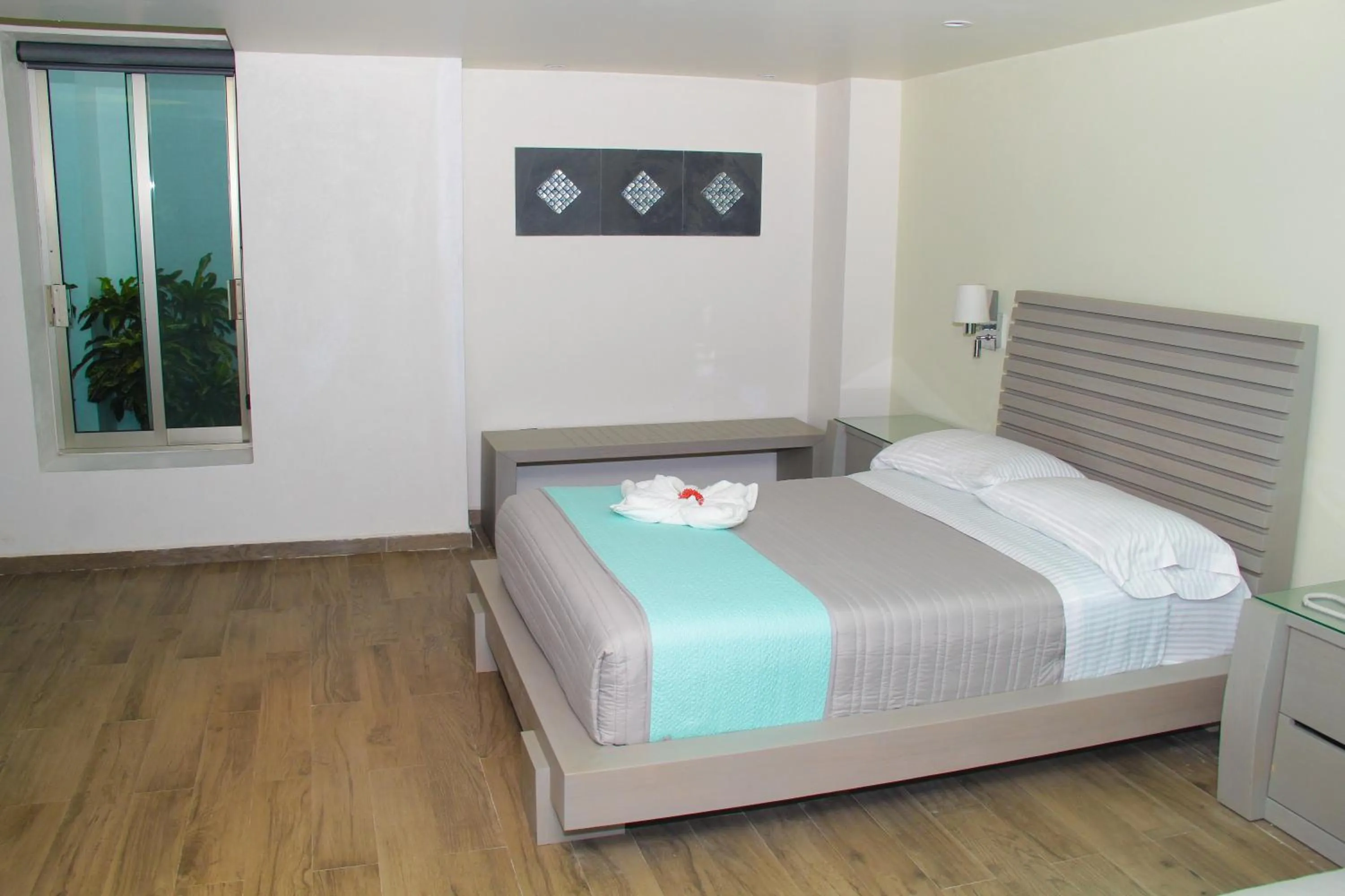 Bed in Villas Maria Isabel