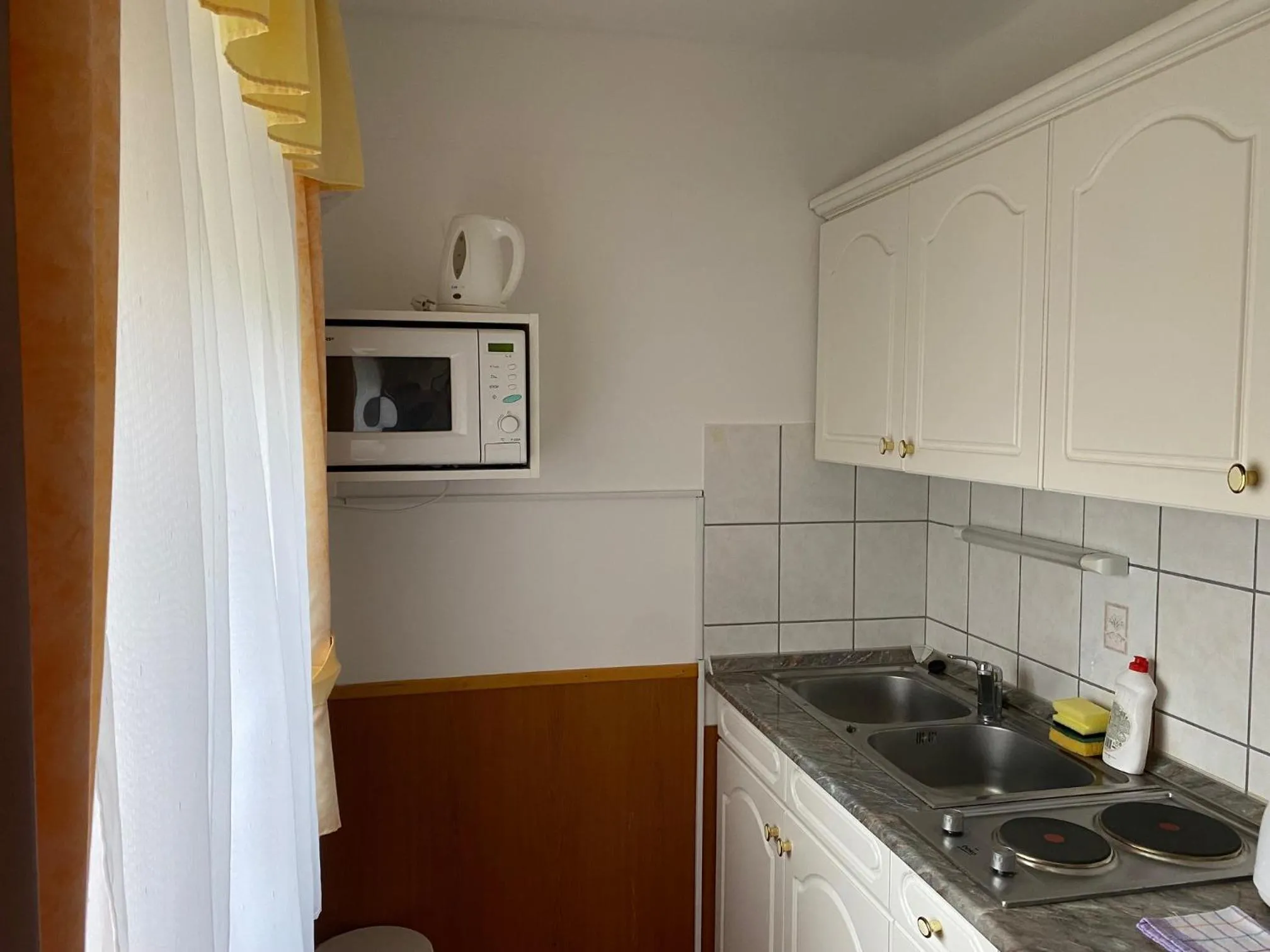 Kitchen or kitchenette in Arany Apartmanház Zalagyöngye