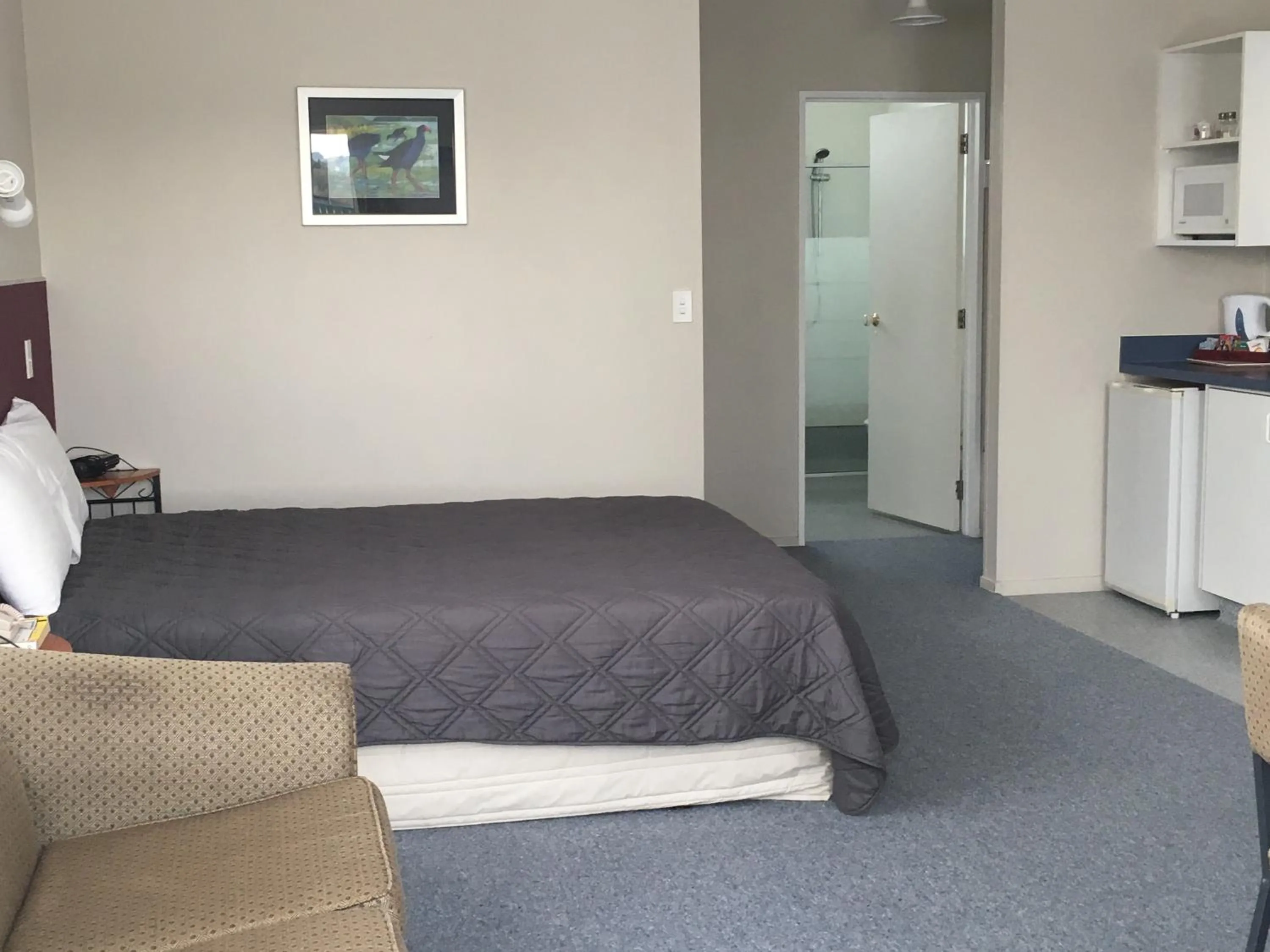 Bed in Thornton Lodge Motel