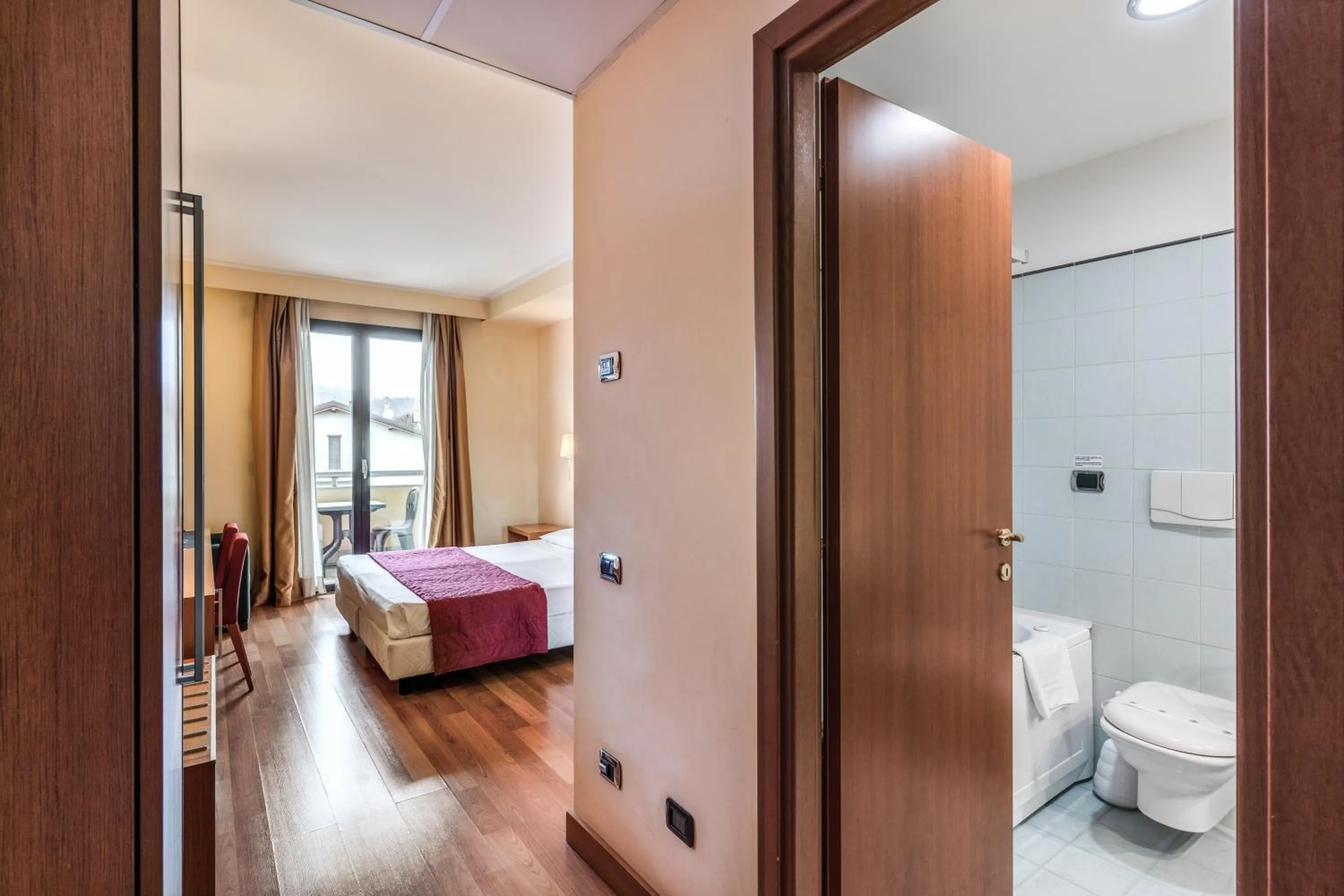 Photo of the whole room, Bed in Luna Hotel Lago Maggiore Arona