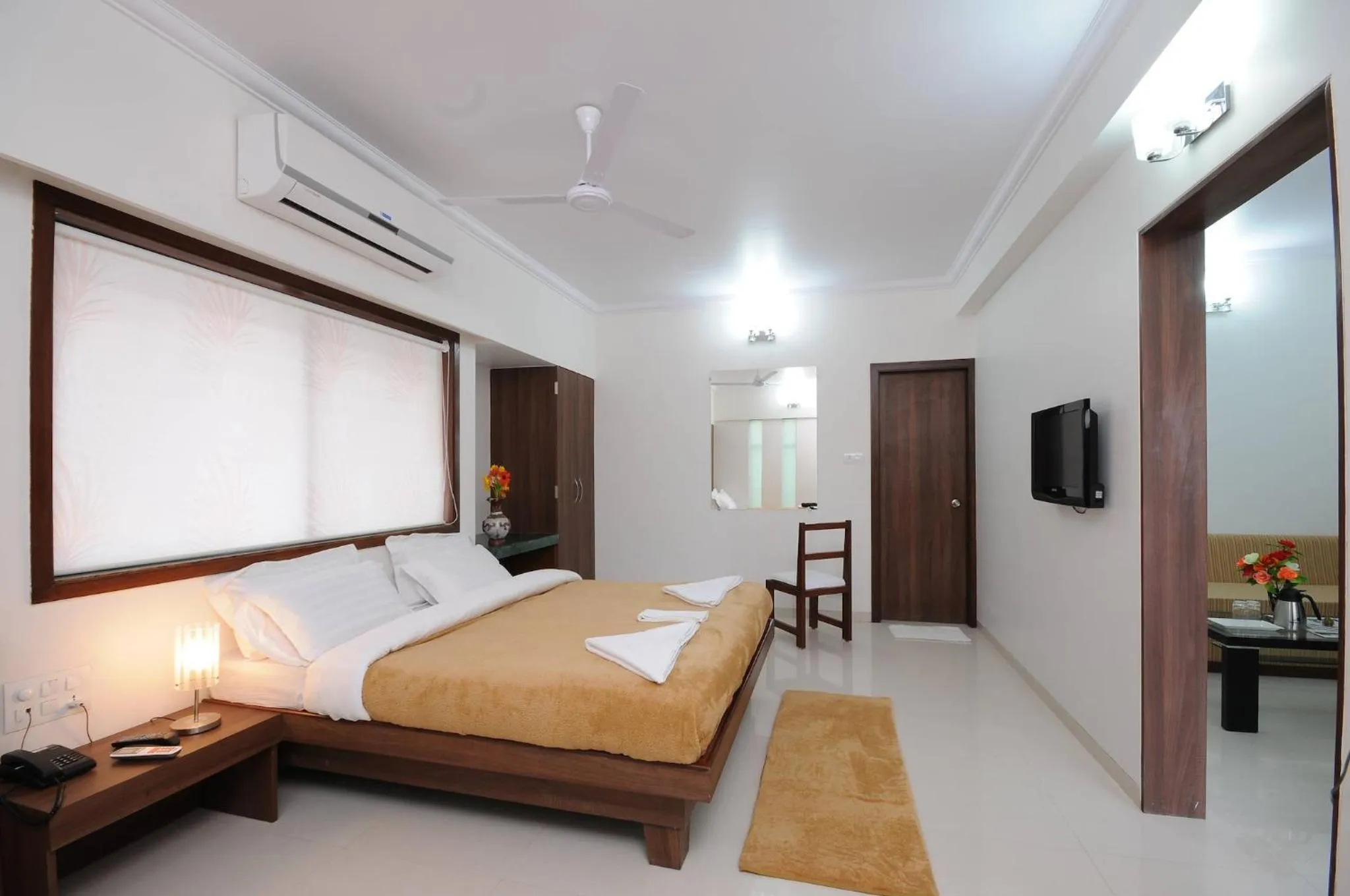 air conditioner, Bed in Hotel Sai Sangam