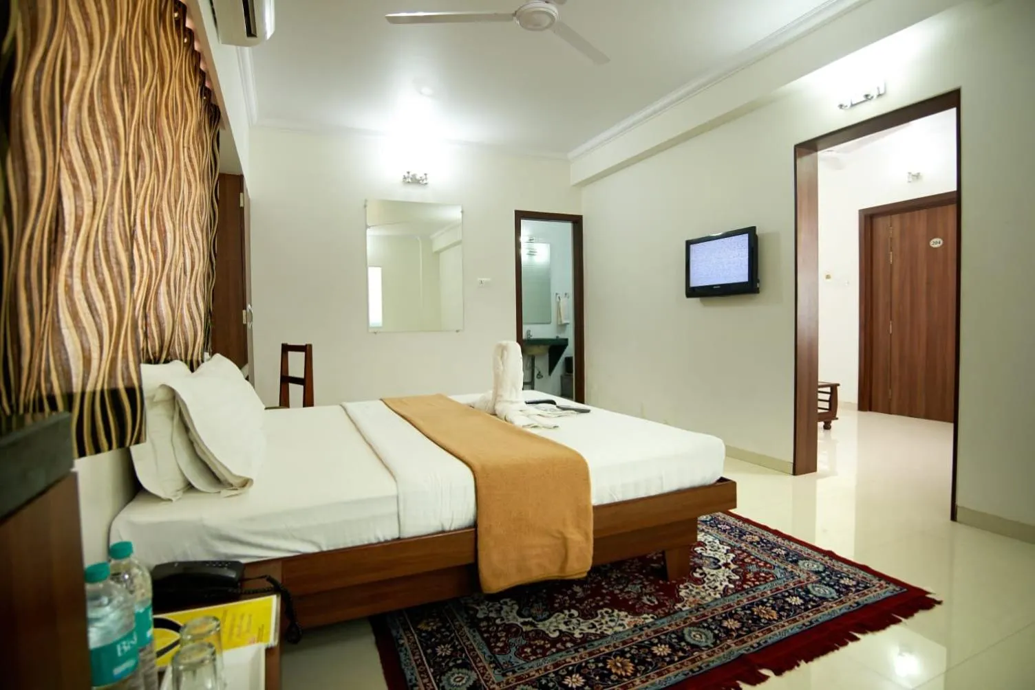 Bed in Hotel Sai Sangam