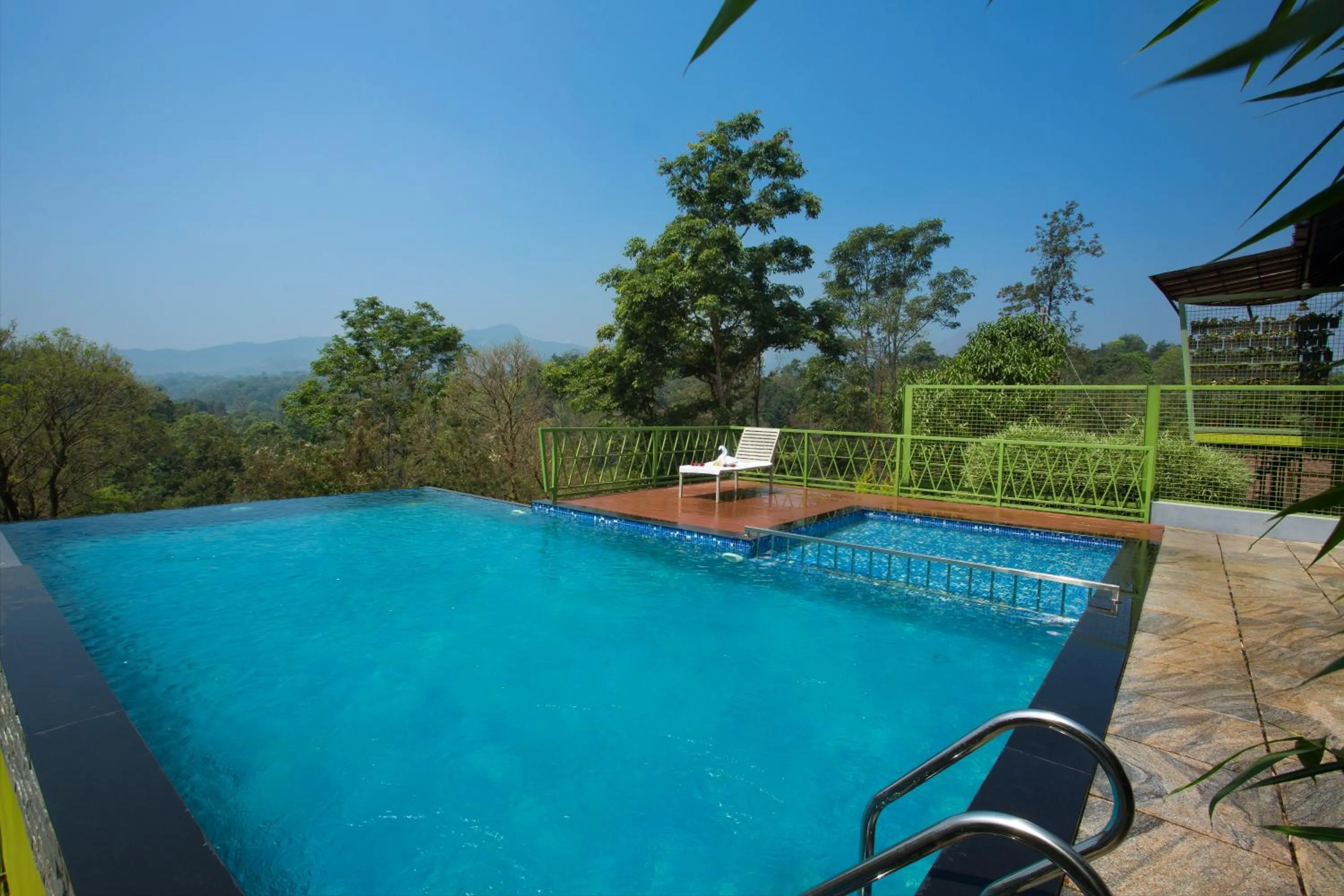 Swimming pool in Amrezy Resort and Spa by Stride, Wayanad