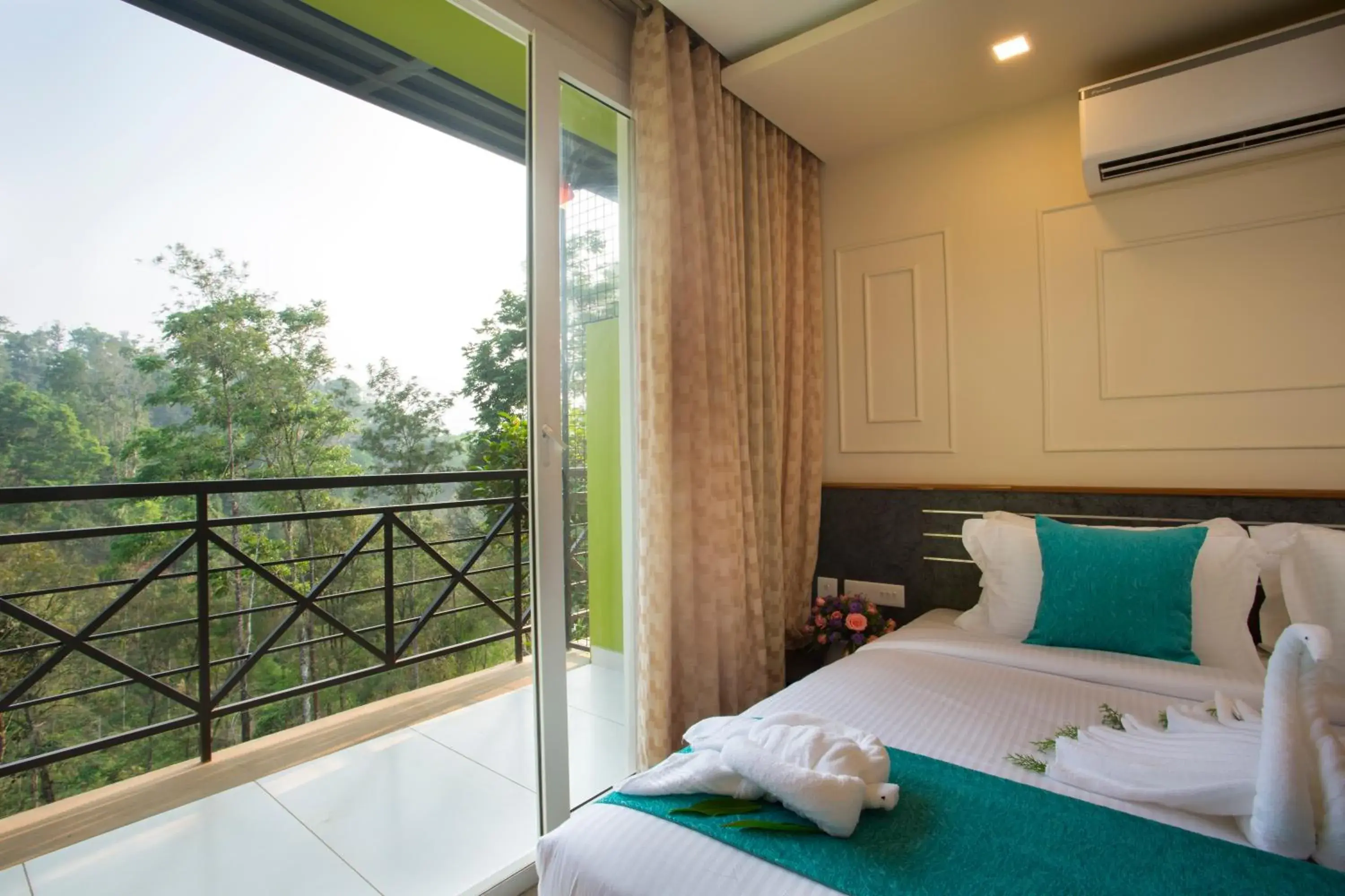 Deluxe Double Room with Balcony in Amrezy Resort and Spa by Stride, Wayanad Deluxe Double Room with Balcony in Amrezy Resort and Spa by Stride, Wayanad