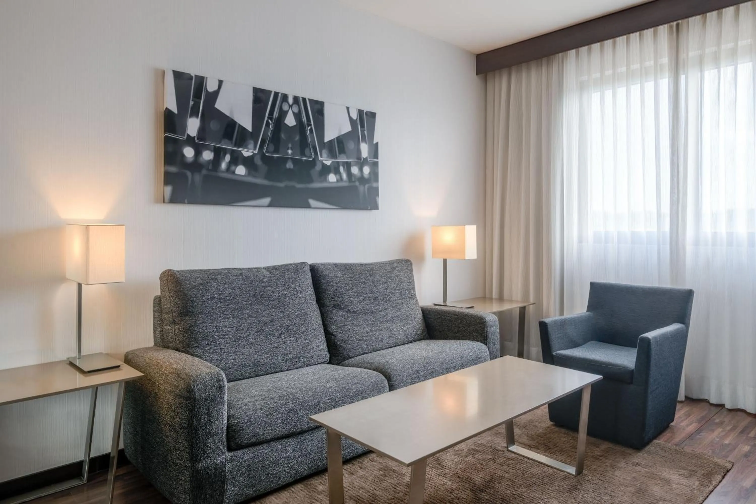 Living room in AC Hotel Vicenza by Marriott