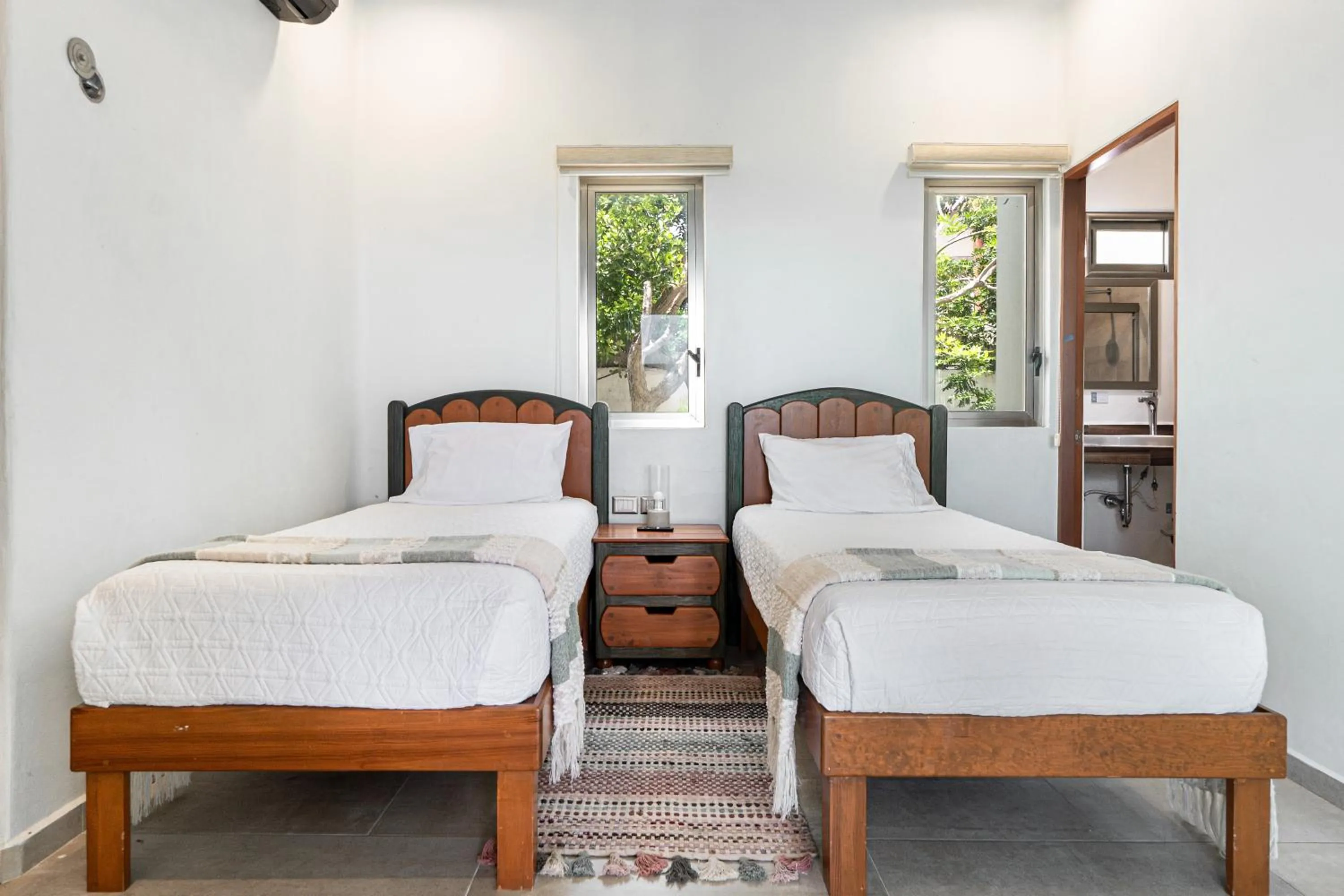 Bed in Villas Amanecer by Andiani Travel