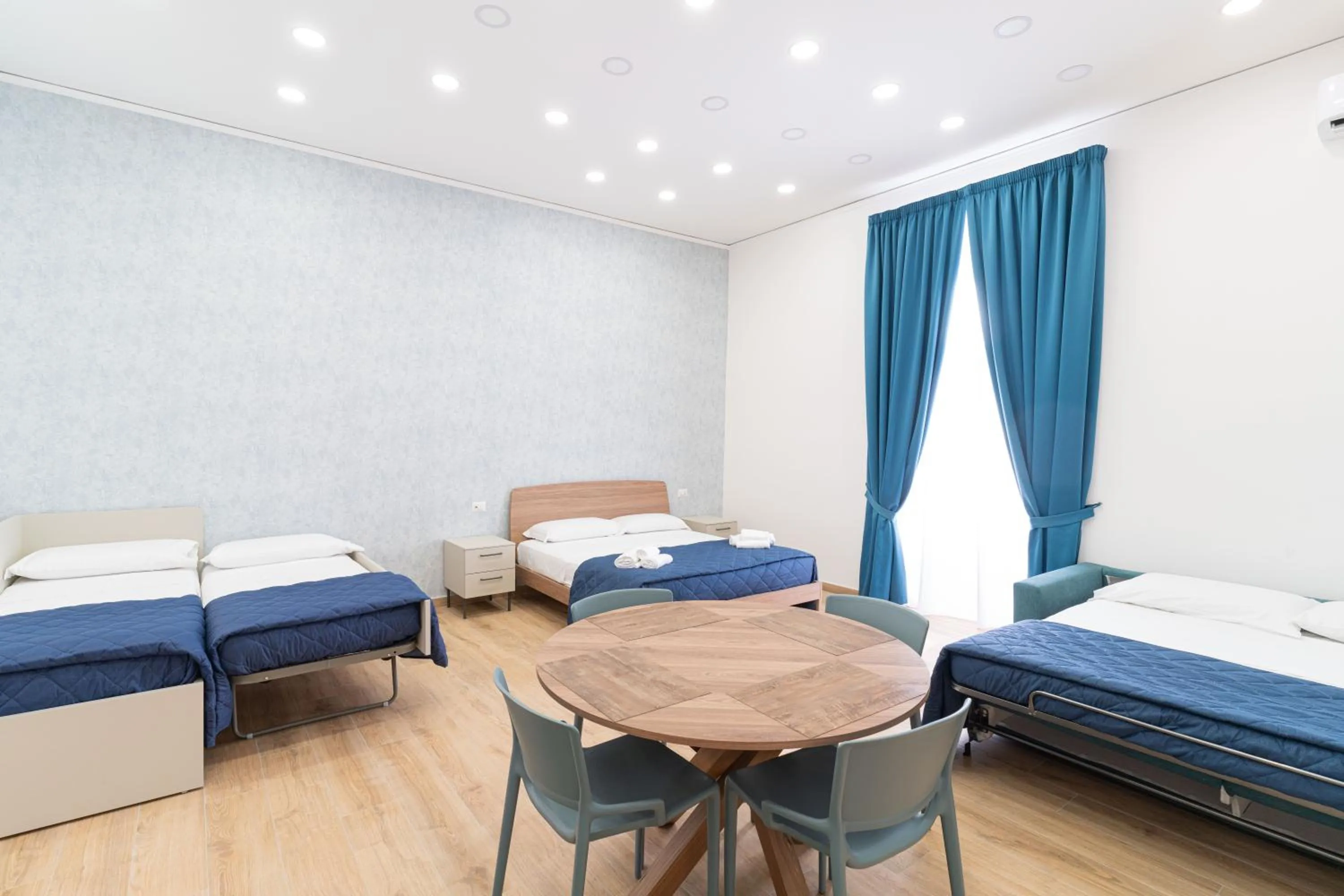 Photo of the whole room, Bed in Toto e Peppino Luxury Rooms