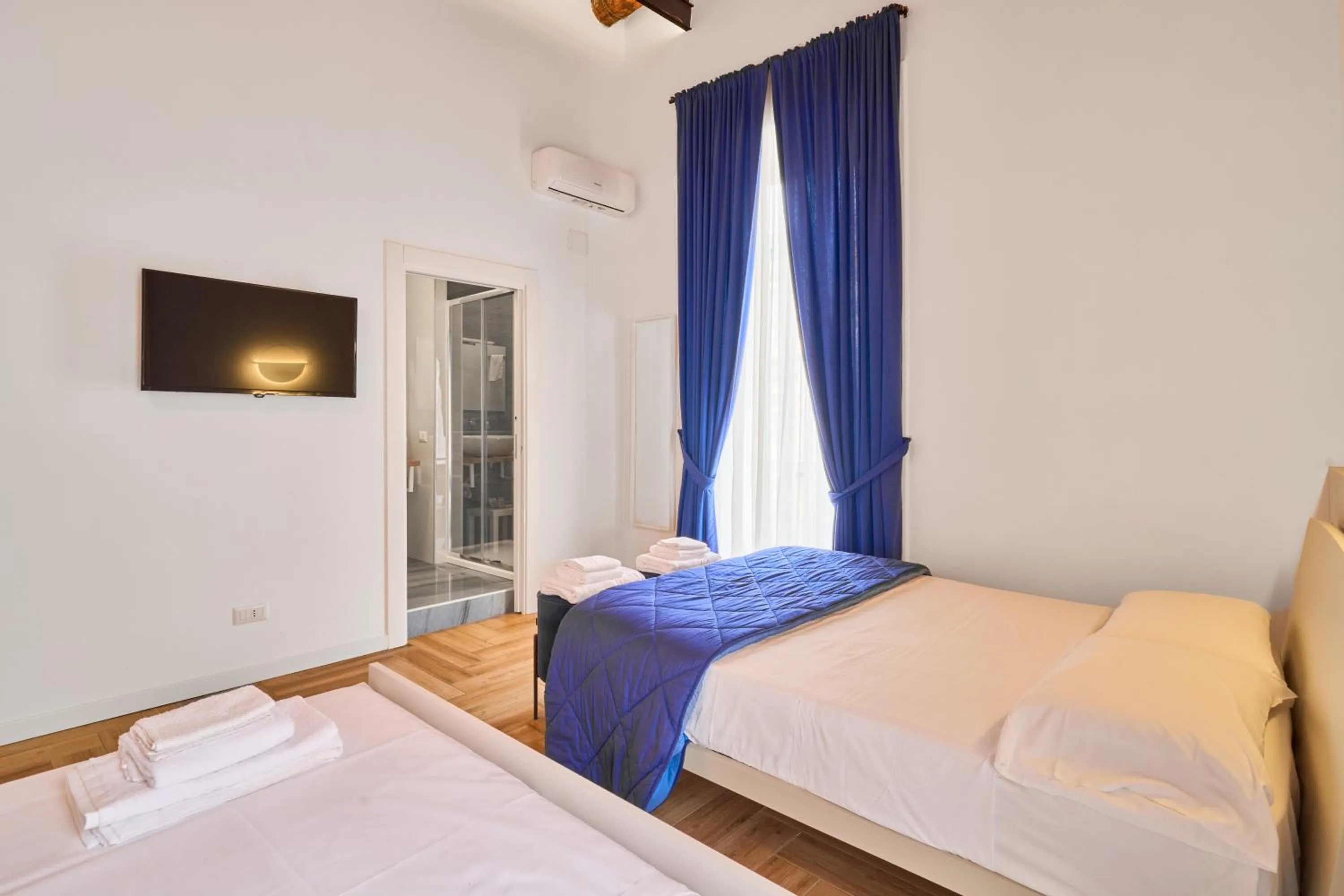 Bed in Toto e Peppino Luxury Rooms