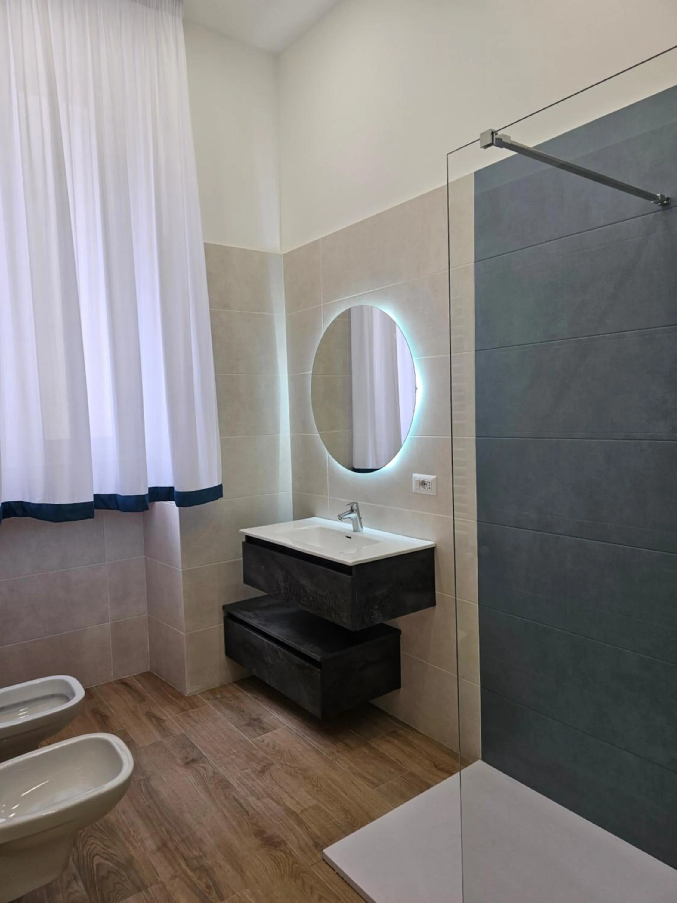 Toilet in Toto e Peppino Luxury Rooms