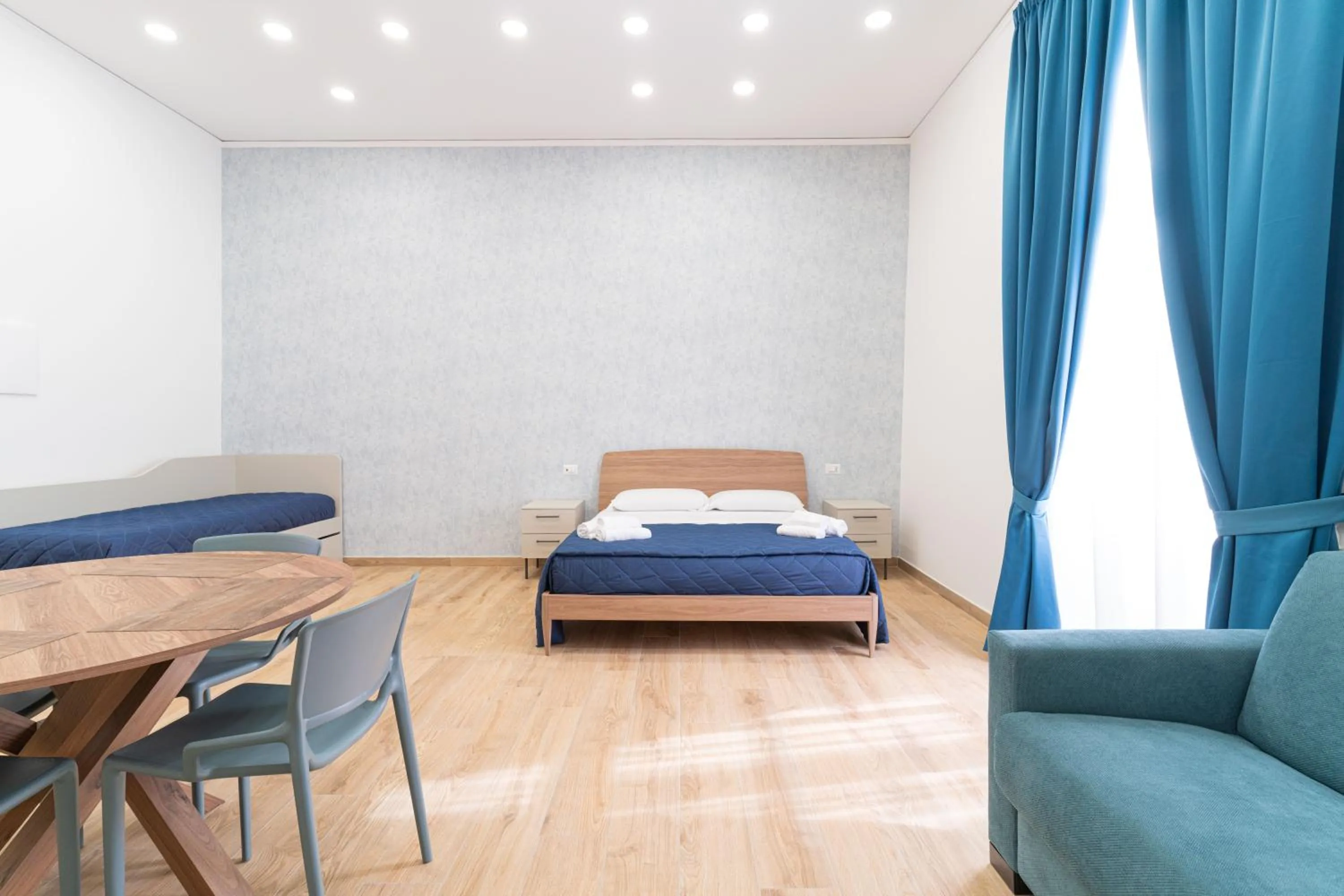 Photo of the whole room, Bed in Toto e Peppino Luxury Rooms