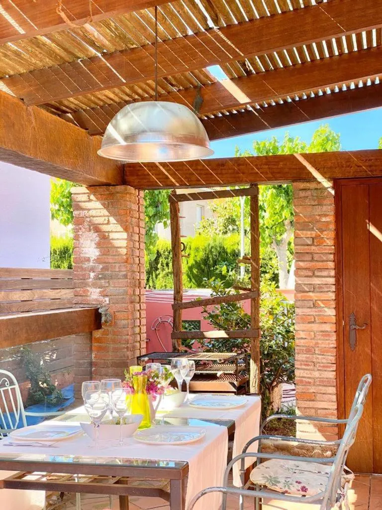 Patio in Cozy holiday home with pool in St Pere Pescador