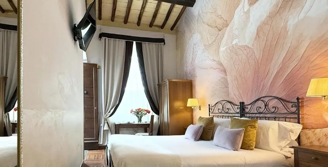 Photo of the whole room, Bed in Le Clarisse Trastevere