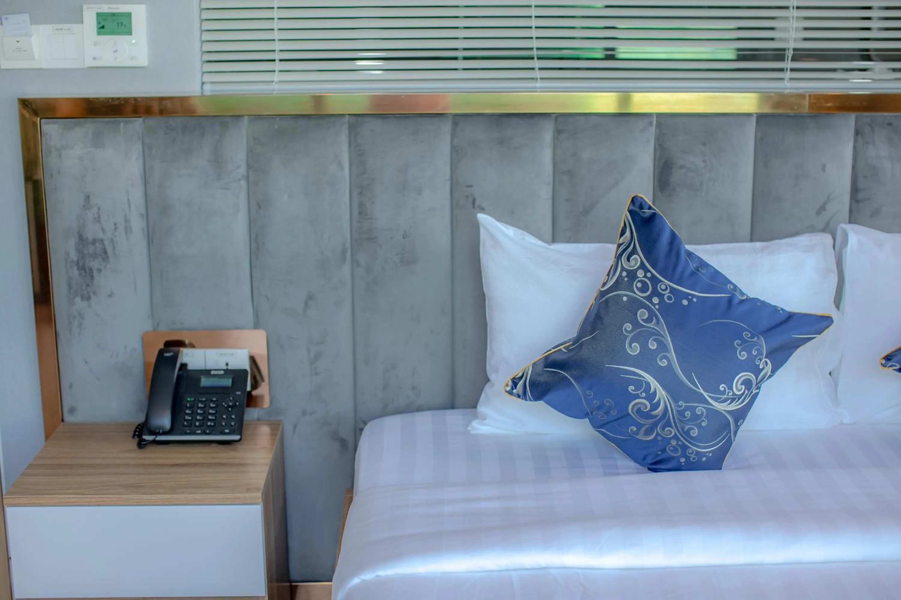 Bed in Seascape Palace Hotel