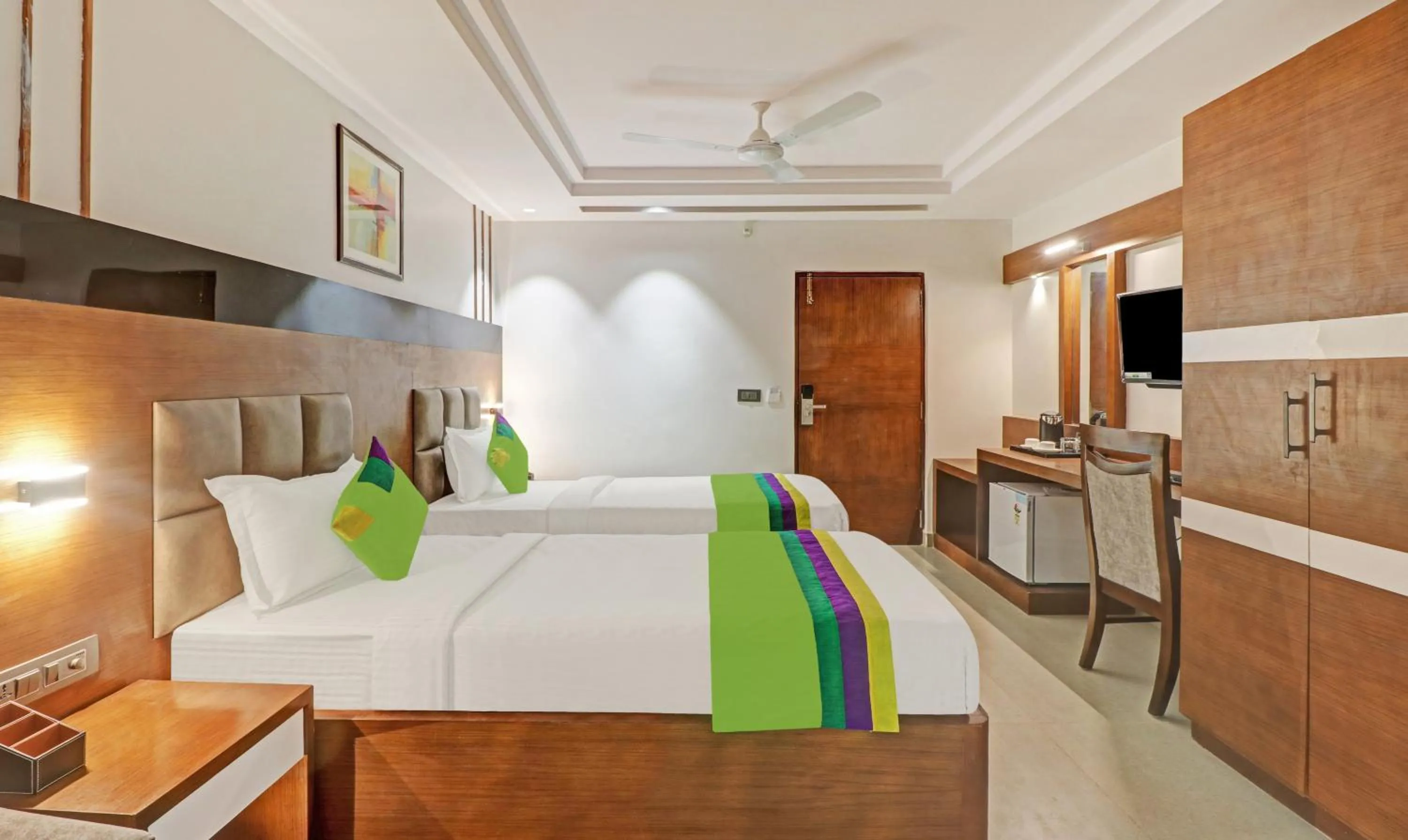 Photo of the whole room, Bed in Treebo Emora Grand