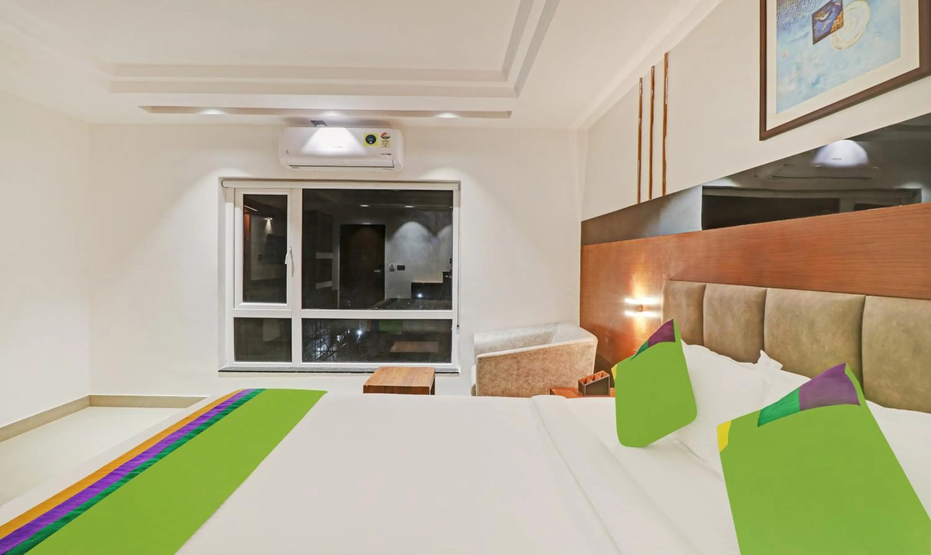 Bedroom, Bed in Treebo Emora Grand