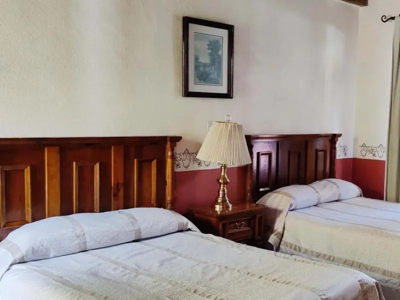 Bed in Hotel Hacienda San Miguel Regla