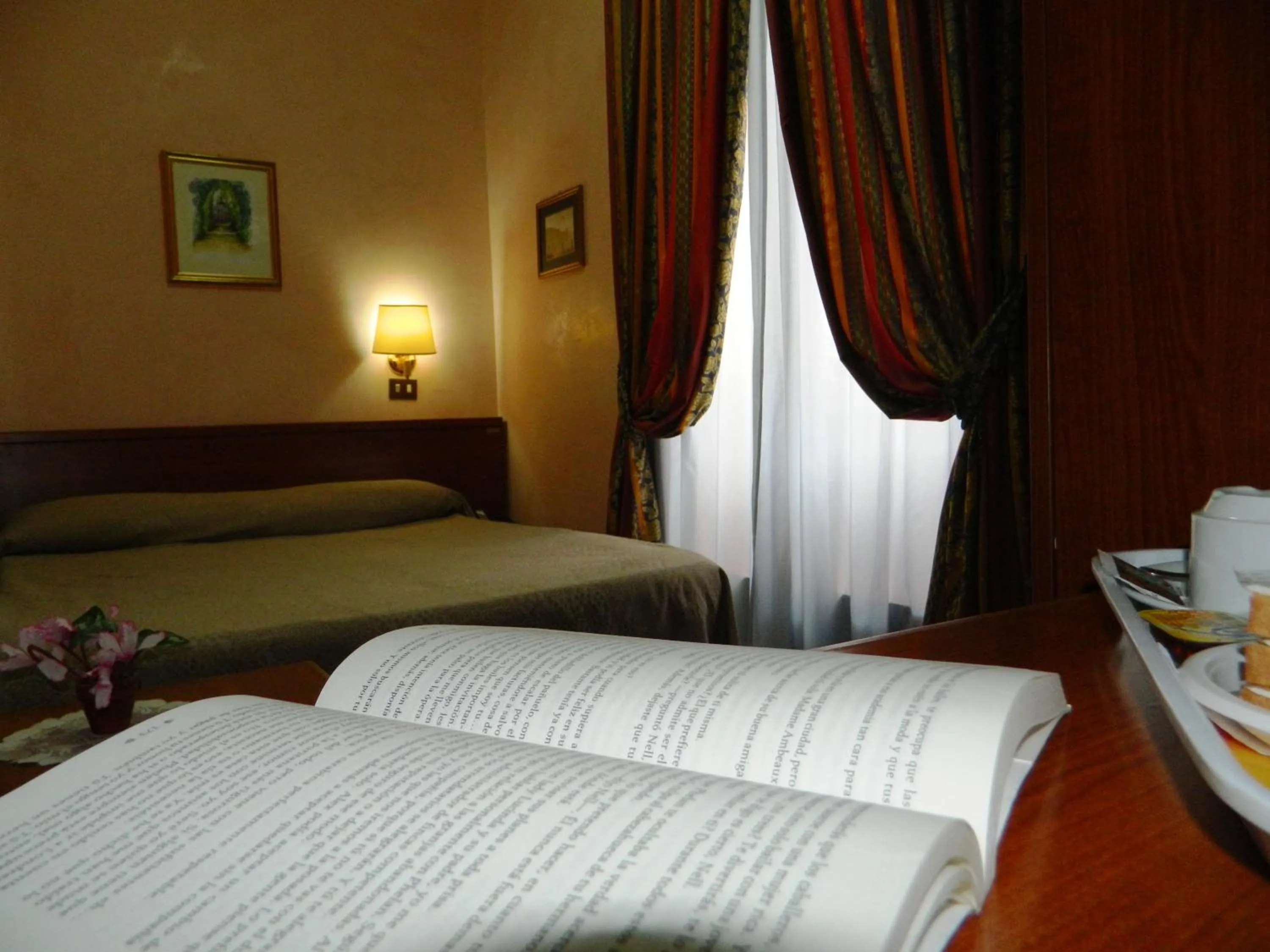 Photo of the whole room, Bed in Buonarroti Home