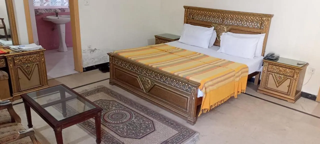 Photo of the whole room, Bed in Luxury Palace Peshawar